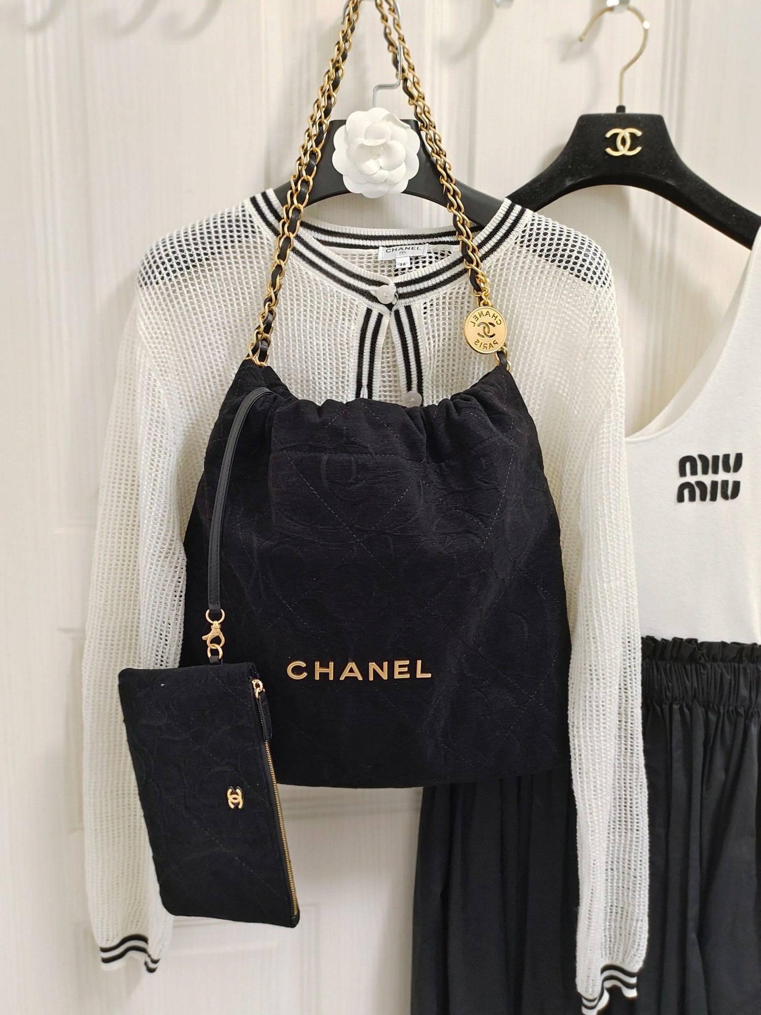 23k Chanel 22bag garbage bag denim camellia black. The camellia pattern is really huge and beautiful!