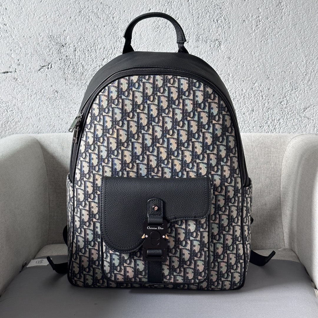 Is it OK to buy
 Dior Bags Backpack Beige Black Printing Men Cotton Cowhide Fabric Winter Collection Oblique