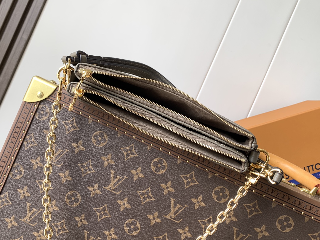 Louis Vuitton Monogram Empreinte 皮革的Liv pochette可紧贴手臂