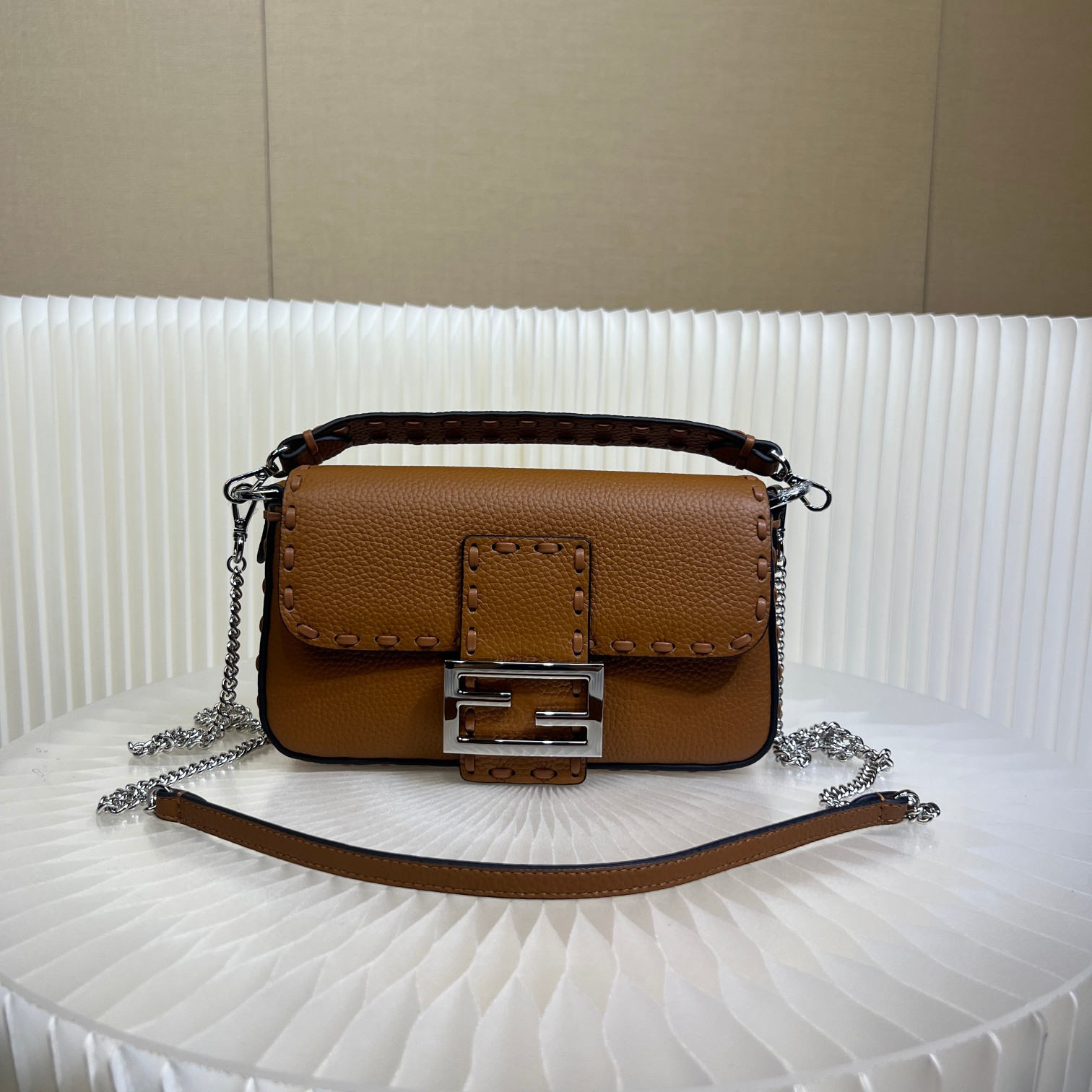 Fendi Baguette Mini Handbag in Brown Cuoio Romano Leather with FF Clasp 1 a1719556437415 3424