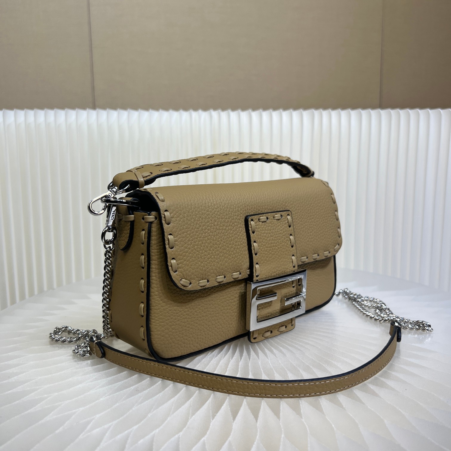 Fendi Baguette Mini Handbag in Cuoio Romano Leather with FF Clasp 2 a1719557116067 4405