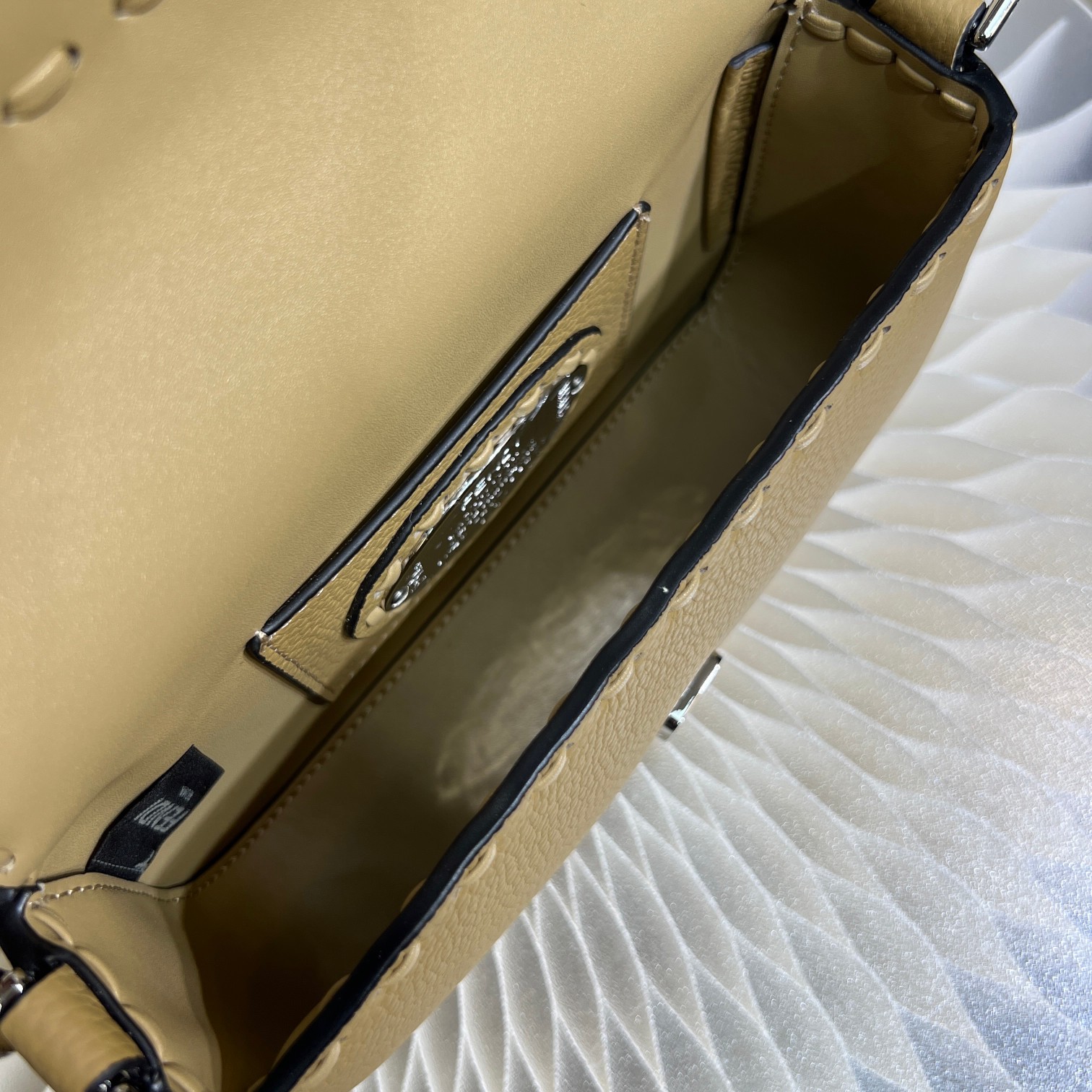 Fendi Baguette Mini Handbag in Cuoio Romano Leather with FF Clasp 7 a1719557117022 1681