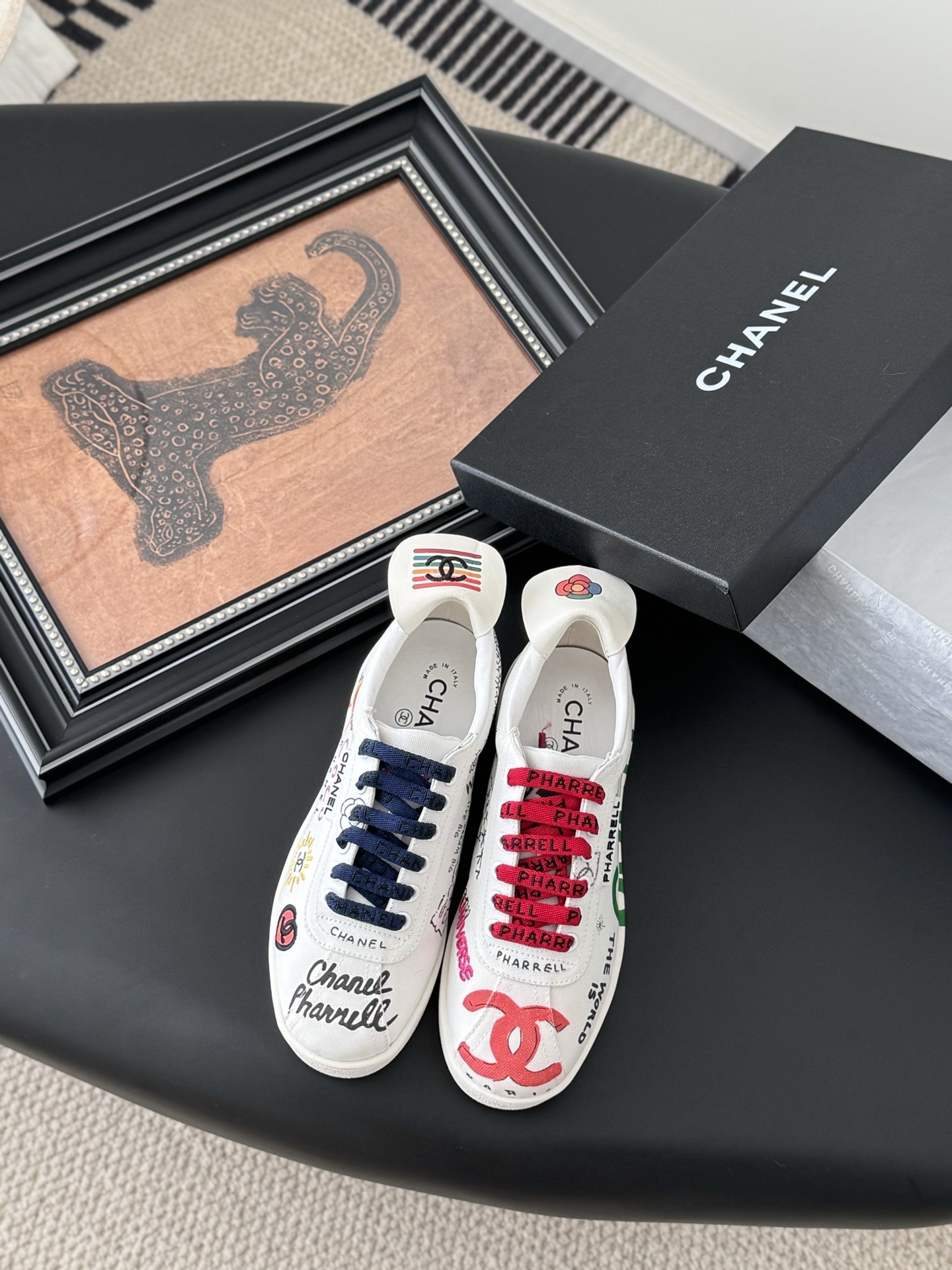 Chanel Graffiti Print Lace-Up Sneakers. Iconic, Stylish, and Comfortable. 3 i1741617517269 4499 0 0
