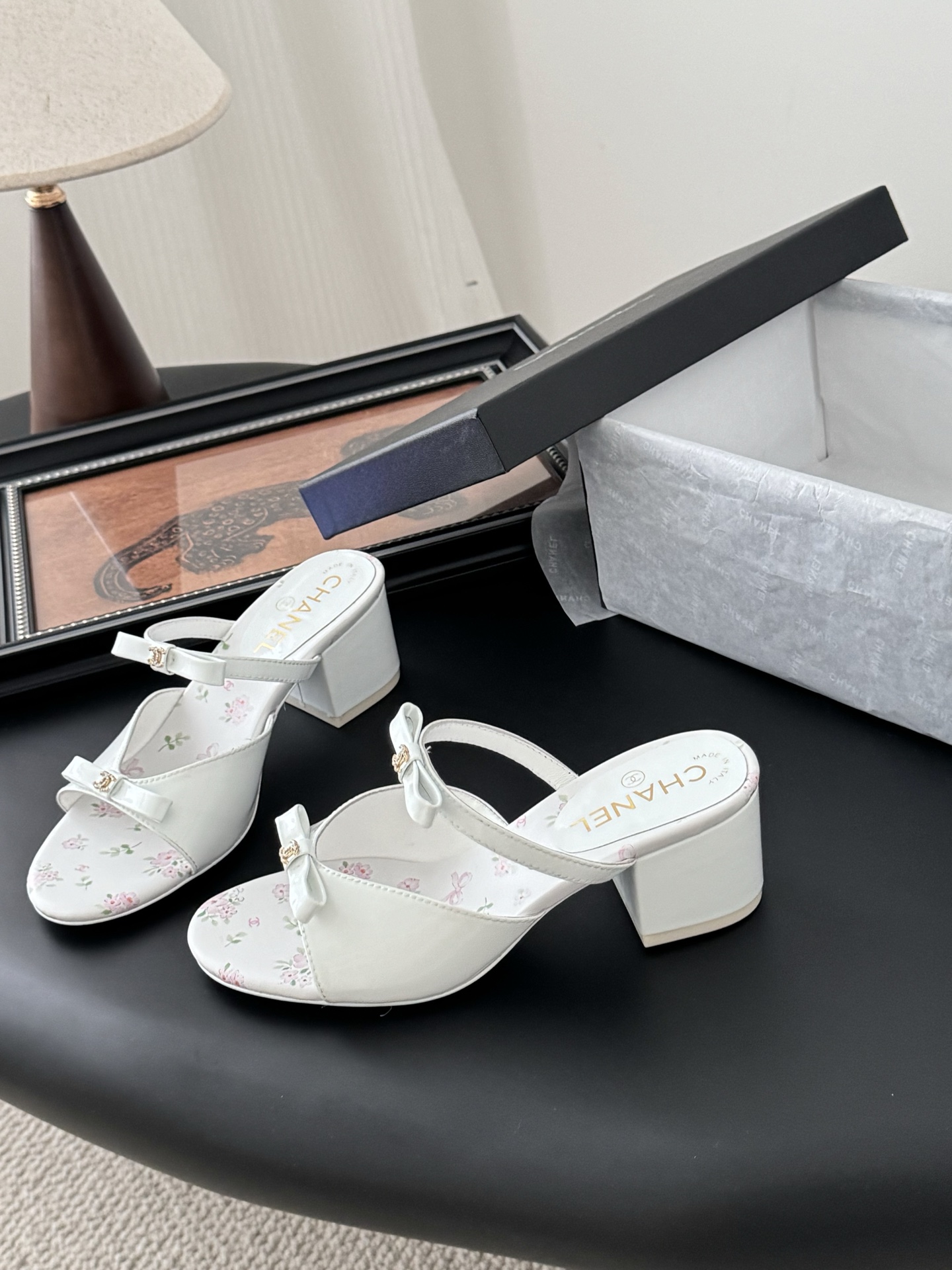 Chanel 2025P Bow Heeled Sandals: Elegant Leather Mules with Floral Accents 2 i1743857703479 4309 0 1