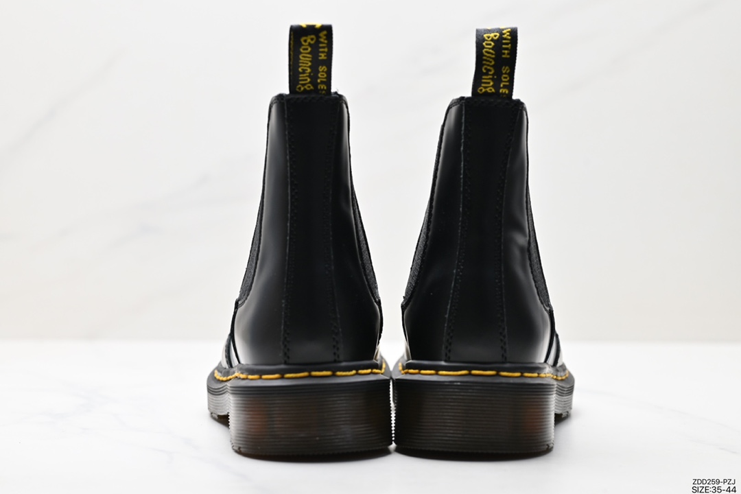 Couple's Dr Martens leather boots high top