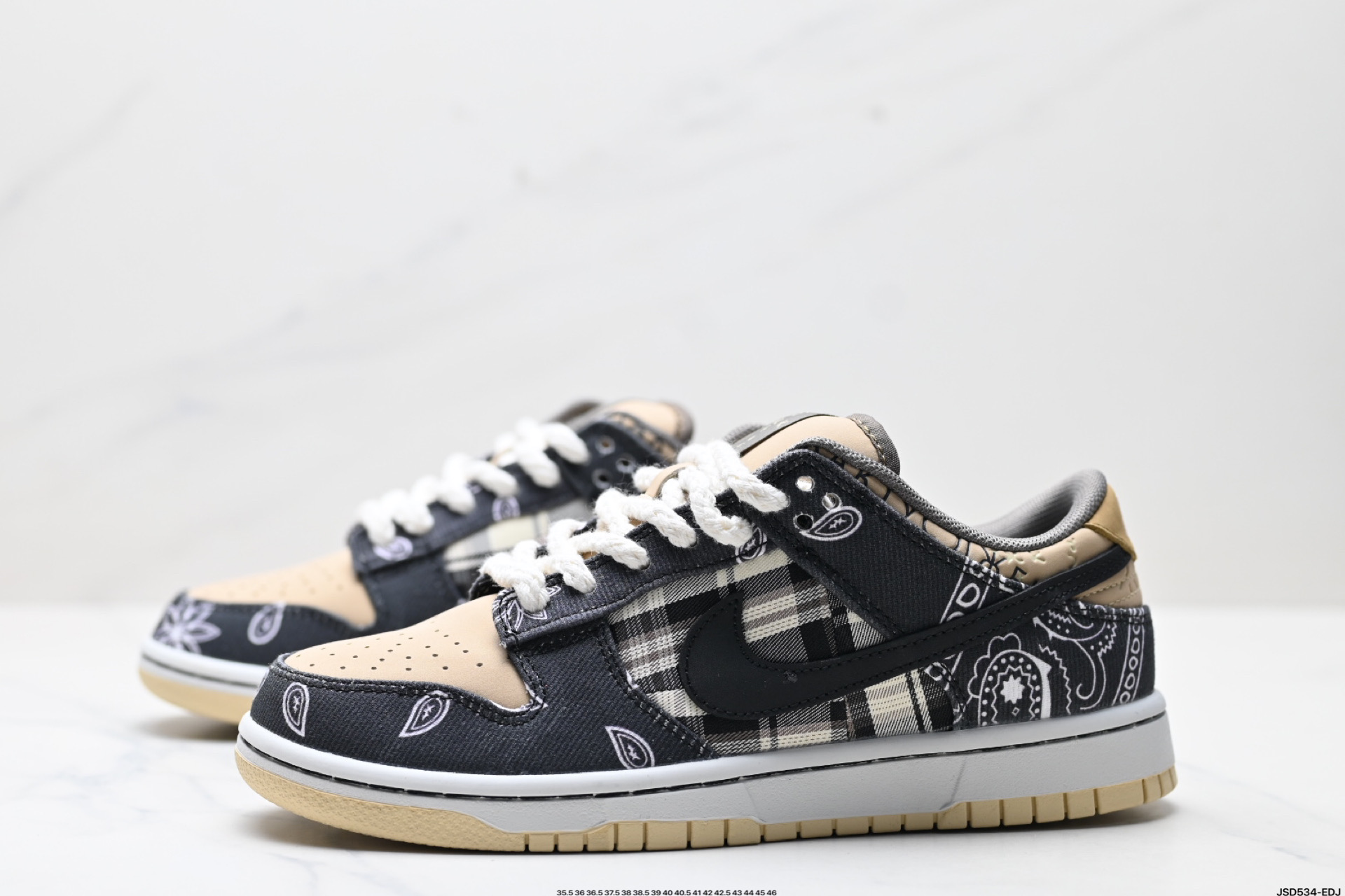 放店💰160 腰果花CT5053-001 公司级🌲耐克NIKE DUNK LOW 扣篮系列 复古低帮休闲运动滑板板鞋 Travis Scott x Nike Dunk SB Low " Jackboys "腰果花印花耐磨防滑低帮板鞋男女同款❗原盒首发版本❗ 双层鞋面可撕破‼️ 加厚鞋舌的填充，使舒适性大大提升。中底采用 Zoom Air 气垫，提供减震防护，带来舒适体验。鞋底设计采用耐用的橡胶外底可在各种运动表面上提供牵引力。 大厂出品，行业标杆之作❗ 继AJ鞋款和AF1鞋款之后TS和Nike又一个全新的合作鞋款，同样采用了拼接的设计。只是在材质上采用了更具有质感的牛仔布 还具有撕撕乐的属性，腰果花的鞋款撕开里面还有一层特殊的鞋面，而鞋舌上的“Cactus Jack”也是证明了出自Travis Scott之手。 采用脚感柔软舒适ZoomAir气垫 有效吸收滑板等极限运动在落地时带来的冲击力 为街头运动者们提供更好的保护 尺码：35.5 36 36.5 37.5 38 38.5 39 40 40.5 41 42 42.5 43 44 45 46 ID:JSD534-EDJ