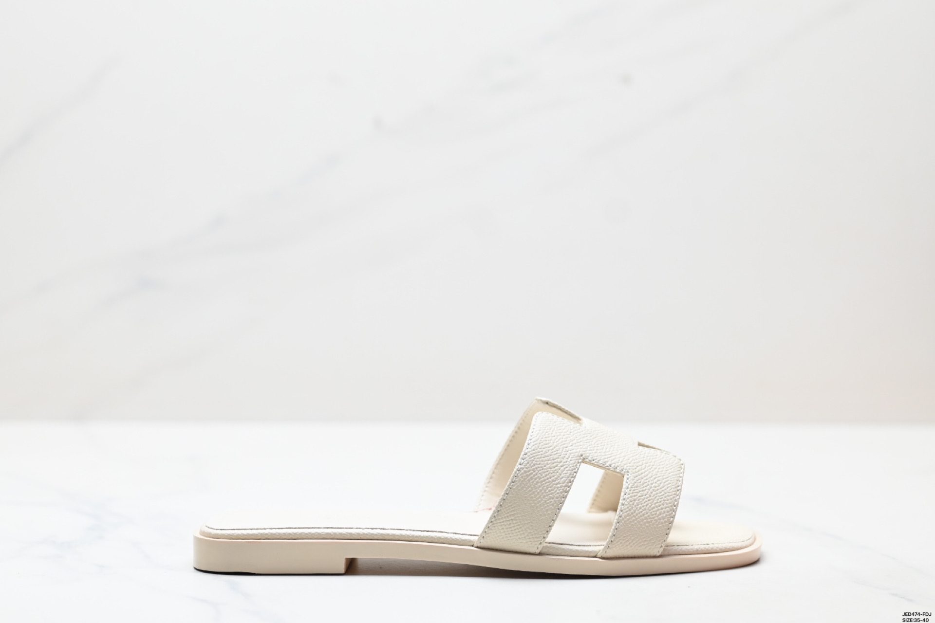 Elegant Hermes Women's Oran Sandal: Comfortable Flat Leather Slides for Summer 5 i1746032608546 911 0 0