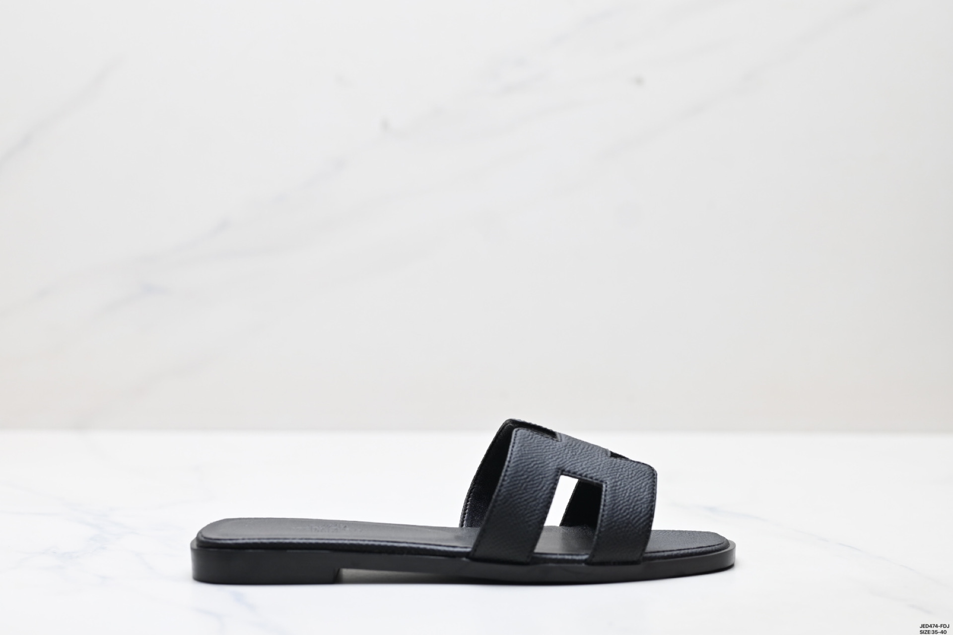 Elegant Hermes Women's Oran Sandal: Comfortable Flat Leather Slides for Summer 2 i1746032628043 2699 0 0
