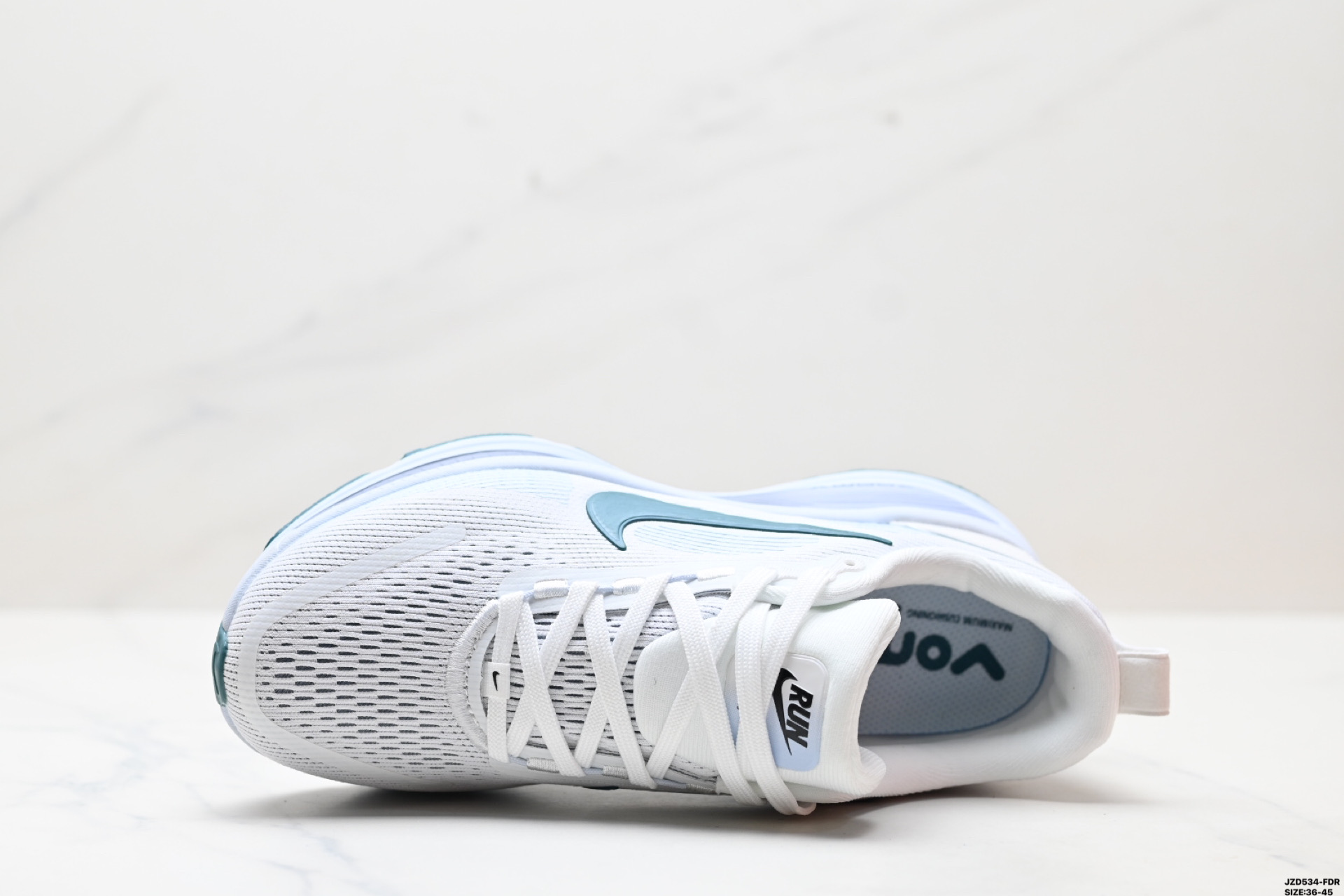 Nike Vomero 18: Comfortable, Cushioned, and Stylish Low-Top Running Shoes 3 i1746721383412 4910 0 1