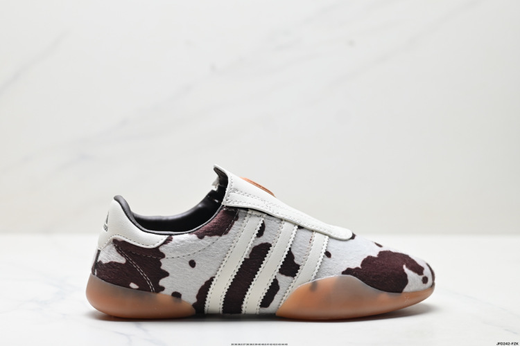 Adidas Originals TAEKWONDO MEI Slip-On Sneakers: Black & White Cow Print 1 Adidas Originals TAEKWONDO MEI Slip-On Sneakers: Black & White Cow Print