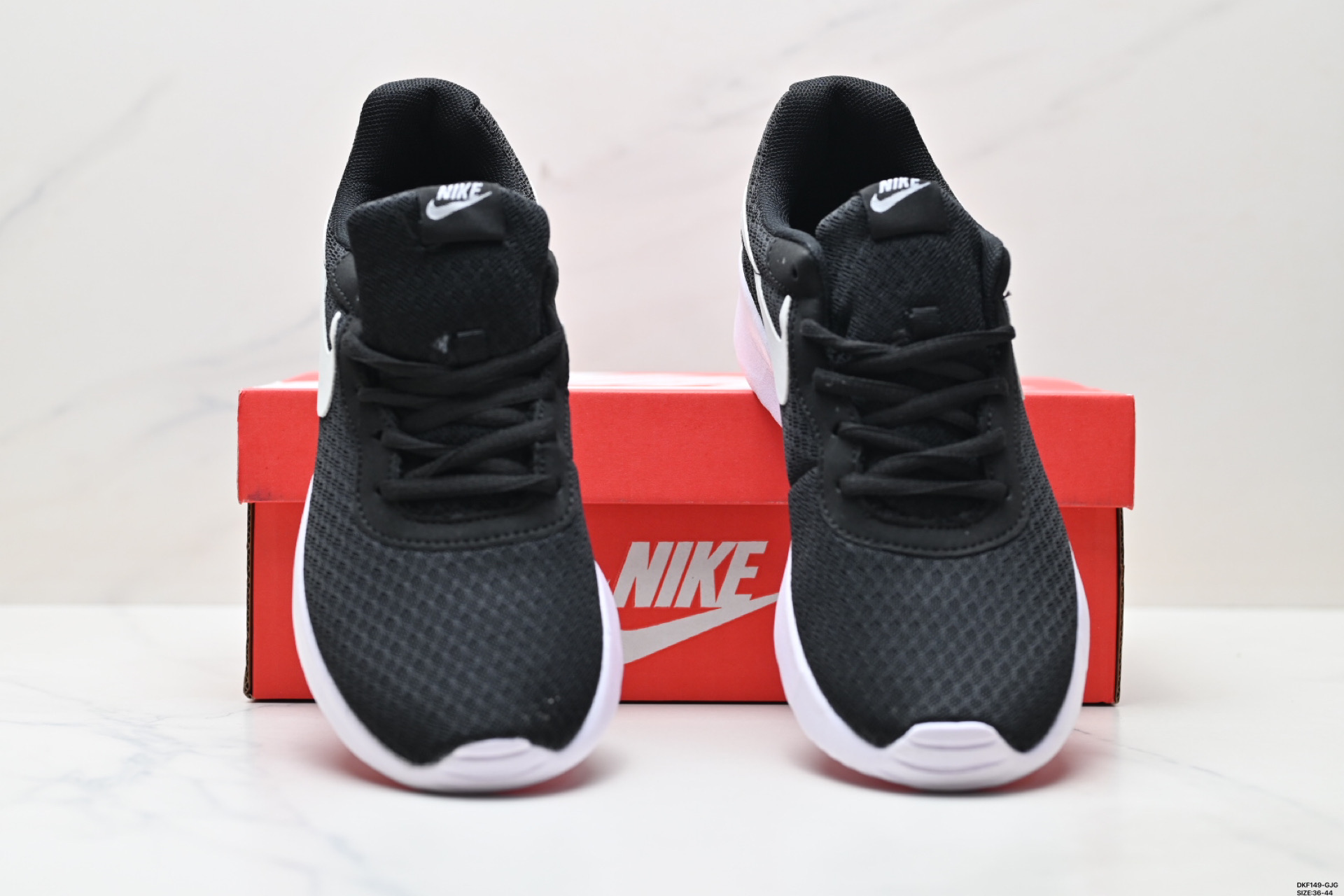 Nike Tanjun: Comodidad, Estilo y Rendimiento en Cada Paso (812654-011) 8 i1750004137577 1646 0 6