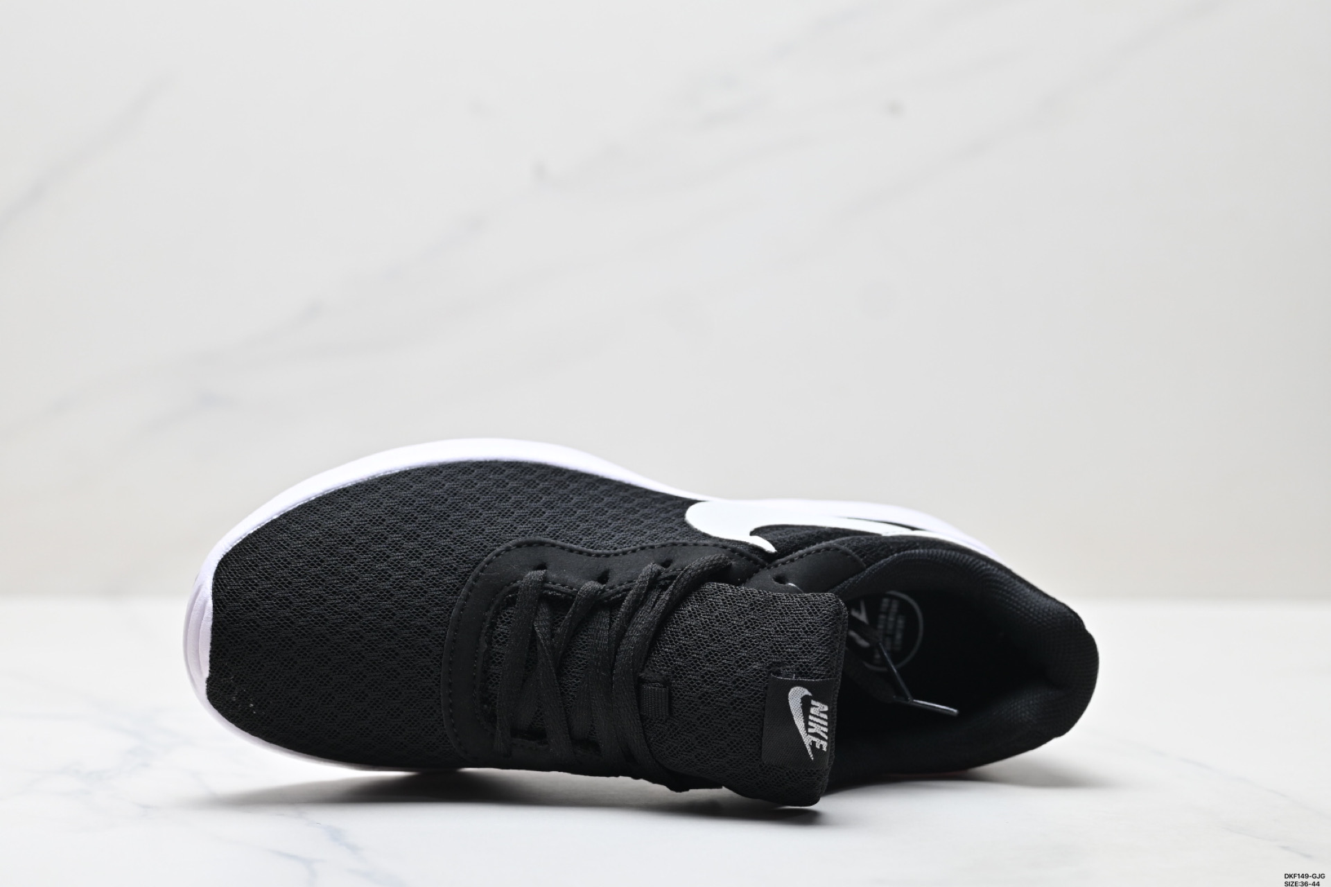 Nike Tanjun: Comodidad, Estilo y Rendimiento en Cada Paso (812654-011) 3 i1750004138382 2913 0 1