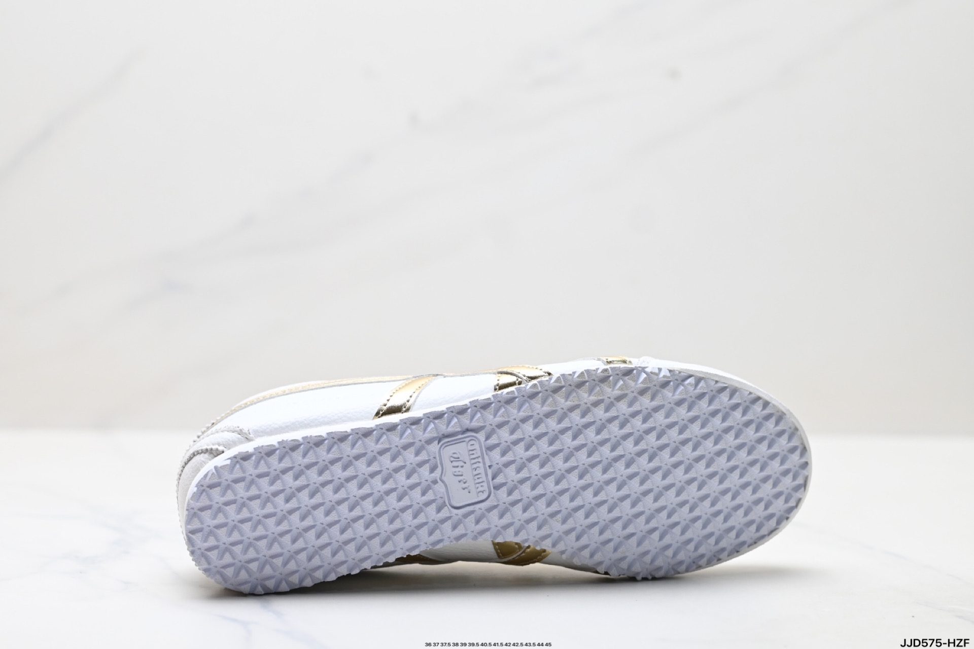 Onitsuka Tiger Mexico 66 Deluxe: Zapatillas Artesanales en Blanco y Dorado 10 i1753376156494 2665 0 8