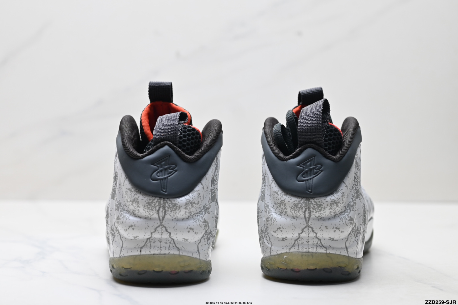 Nike Air Foamposite One Zapatos de Baloncesto Retro en Gris y Blanco 7 i1755535461158 4254 0 5