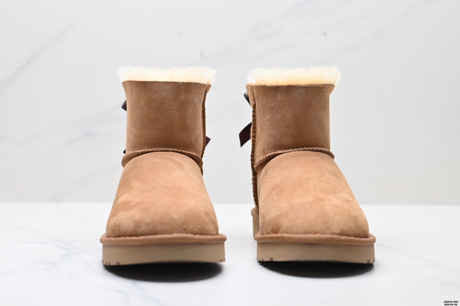 UGG Classic Mini Botas de Nieve con Lazo para Mujer - Calidez y Estilo 8 i1758644149240 4710 0 6