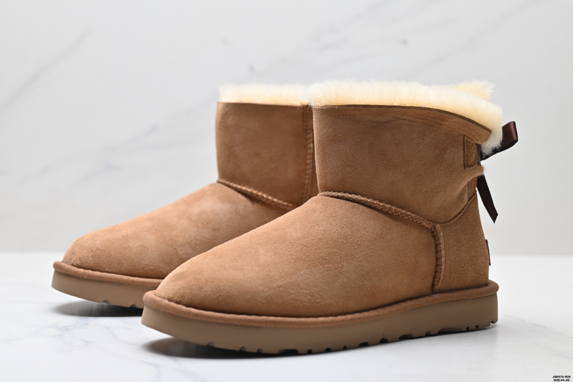 UGG Classic Mini Botas de Nieve con Lazo para Mujer - Calidez y Estilo 5 i1758644149240 9365 0 3