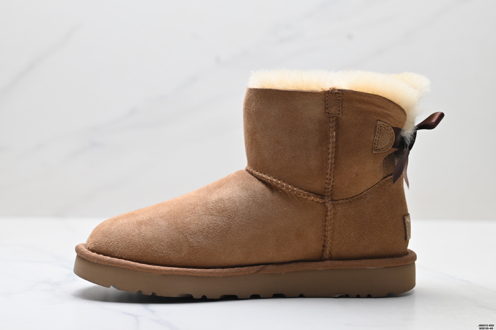 UGG Classic Mini Botas de Nieve con Lazo para Mujer - Calidez y Estilo 4 i1758644149241 6648 0 2