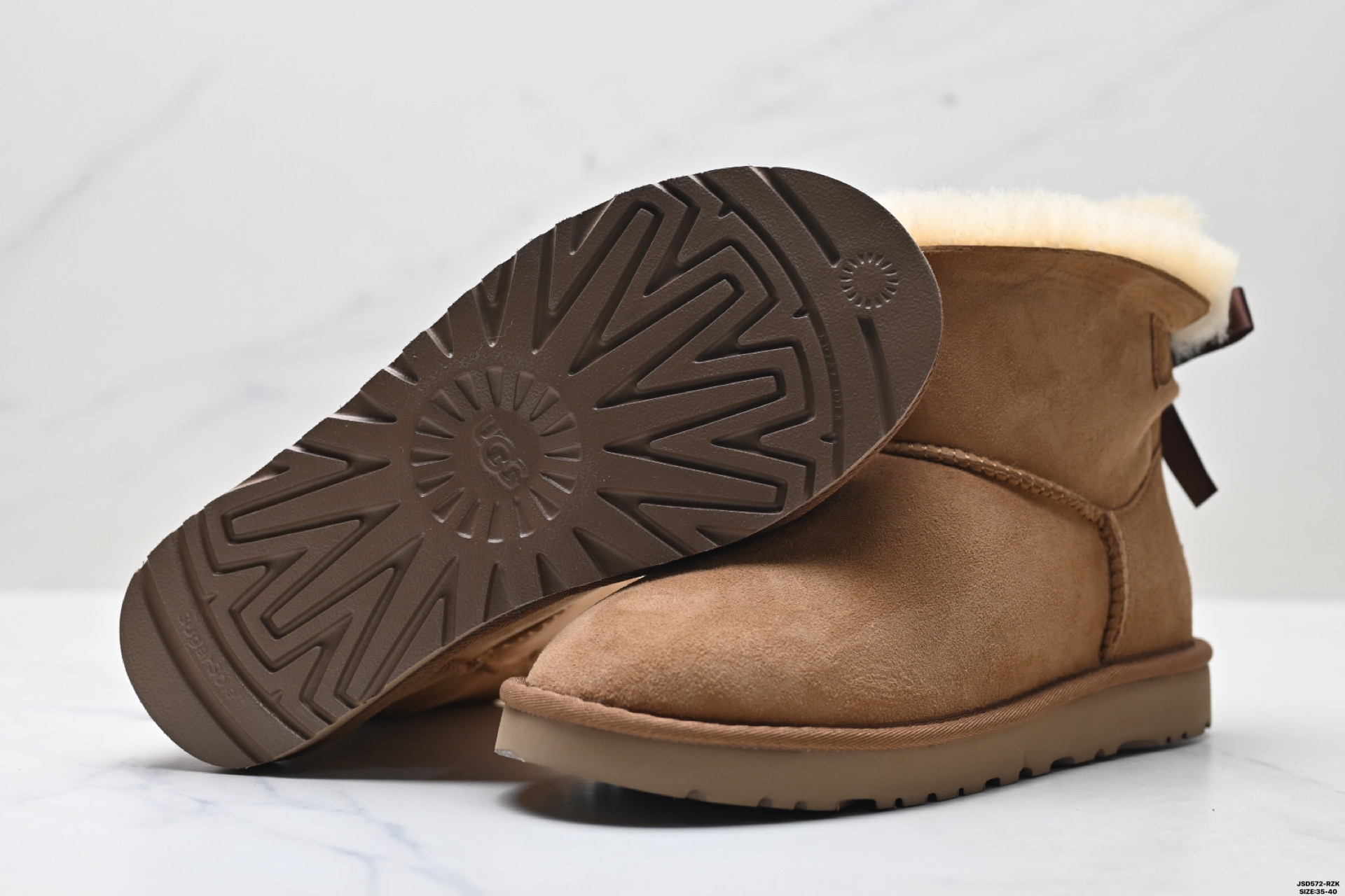 UGG Classic Mini Botas de Nieve con Lazo para Mujer - Calidez y Estilo 9 i1758644149911 3825 0 7