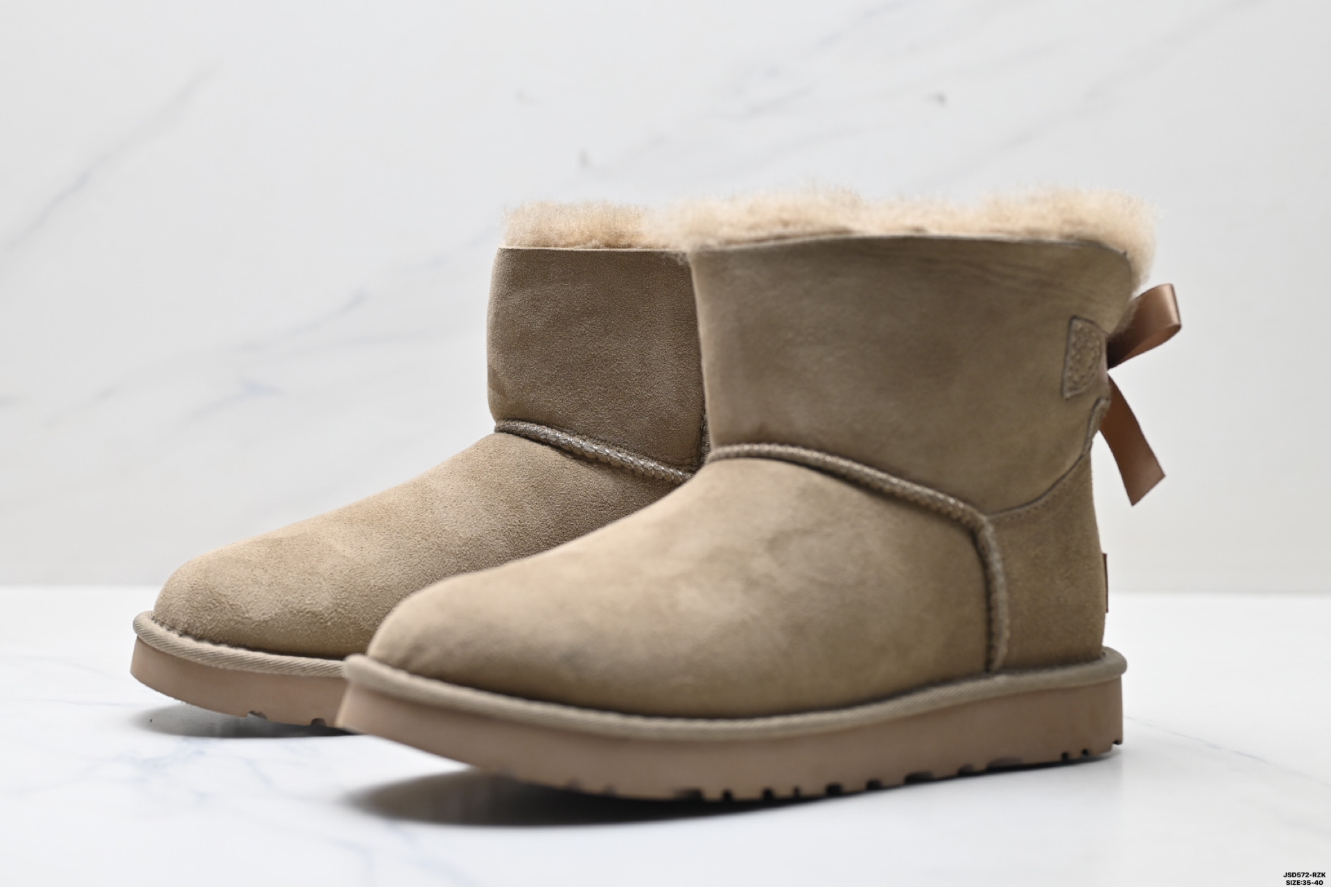 220 UGG 6501 单丝带蝴蝶结秋冬羊皮毛一体雪地靴 全