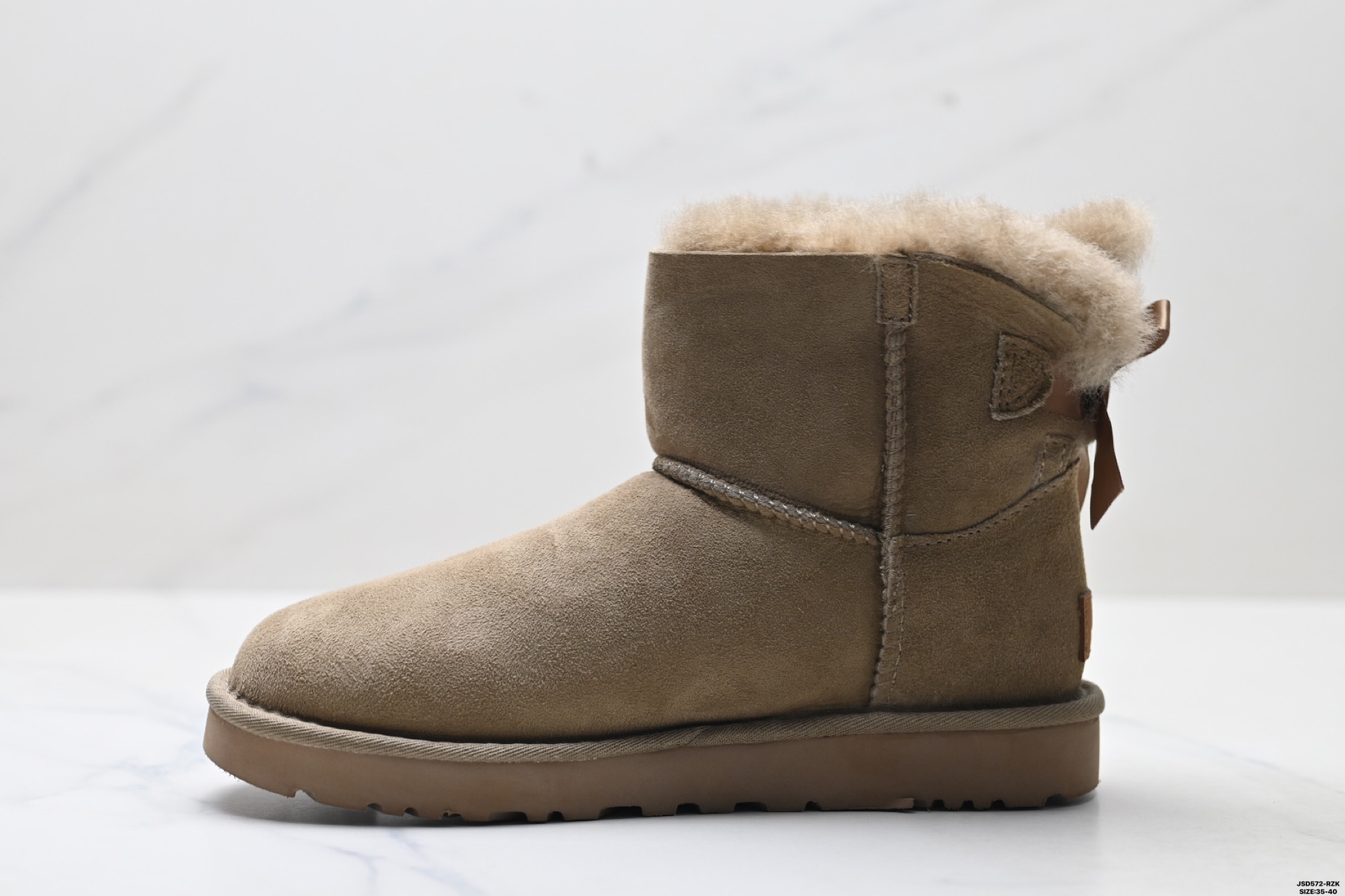 220 UGG 6501 单丝带蝴蝶结秋冬羊皮毛一体雪地靴 全