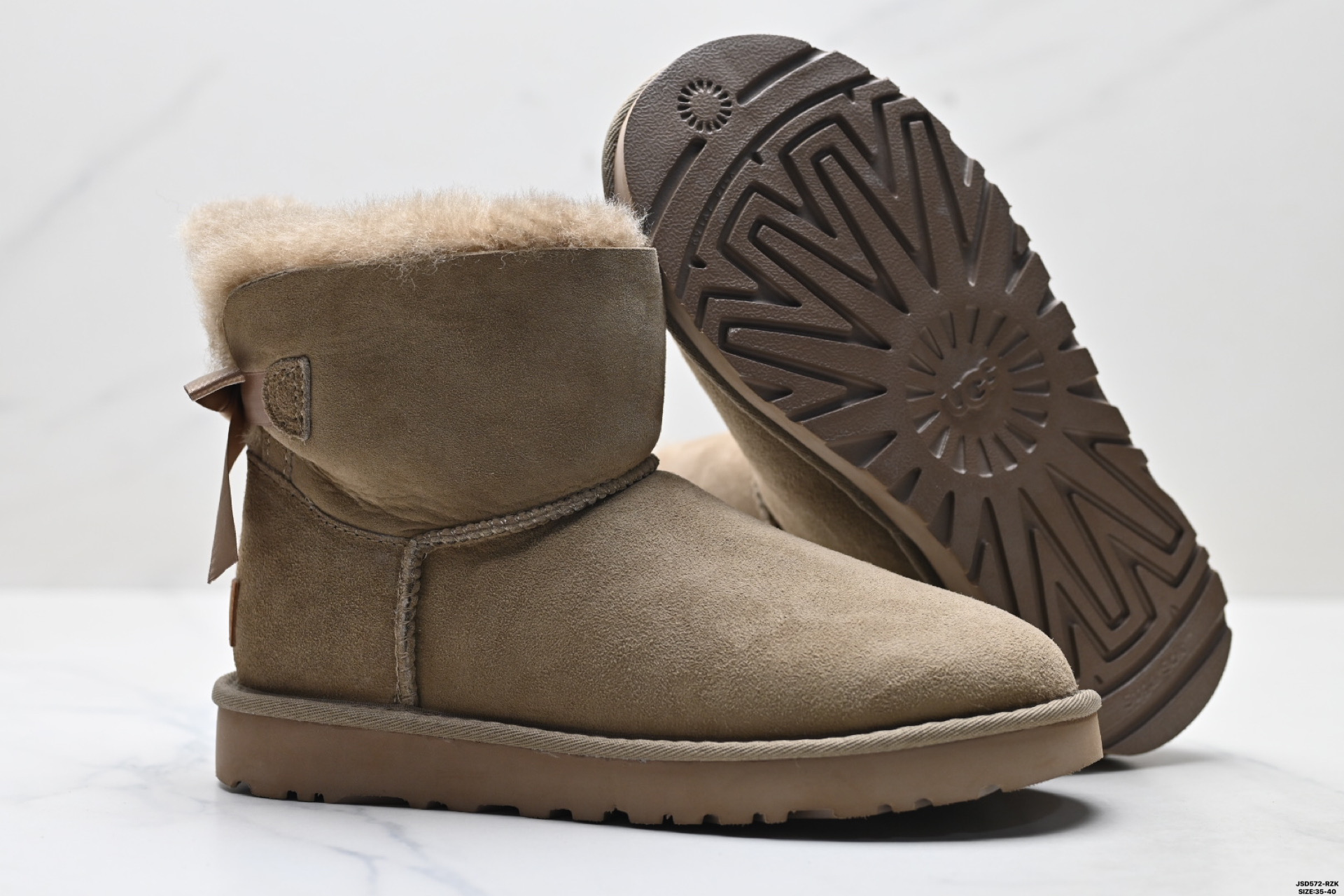 220 UGG 6501 单丝带蝴蝶结秋冬羊皮毛一体雪地靴 全