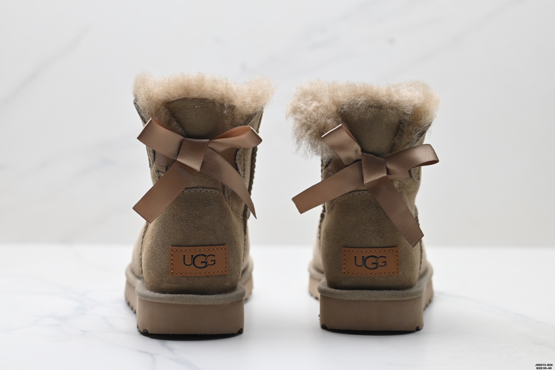 220 UGG 6501 单丝带蝴蝶结秋冬羊皮毛一体雪地靴 全