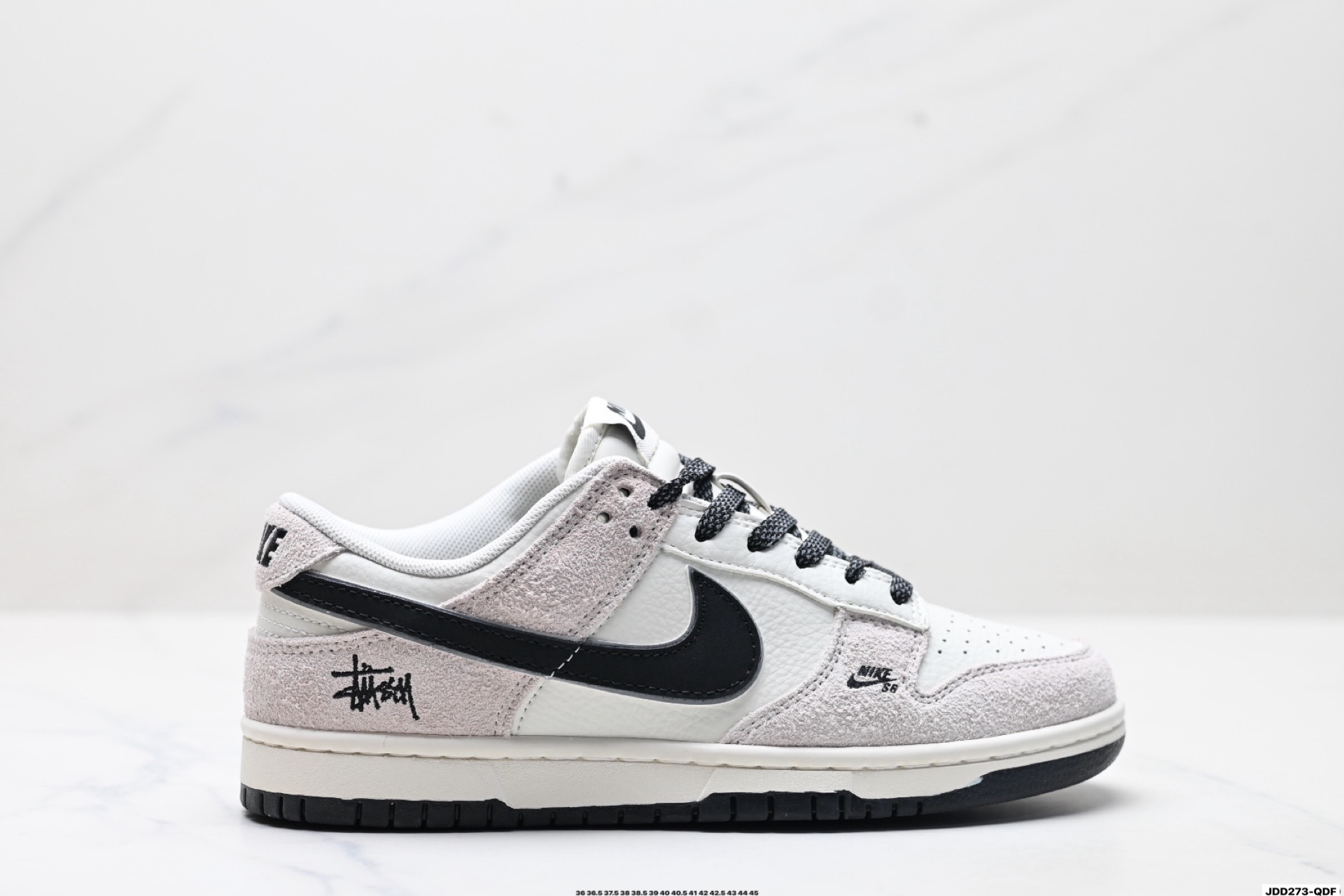 Nike Dunk Low x Stüssy: נעלי סניקרס אופנתיות בעיצוב מותאם אישית