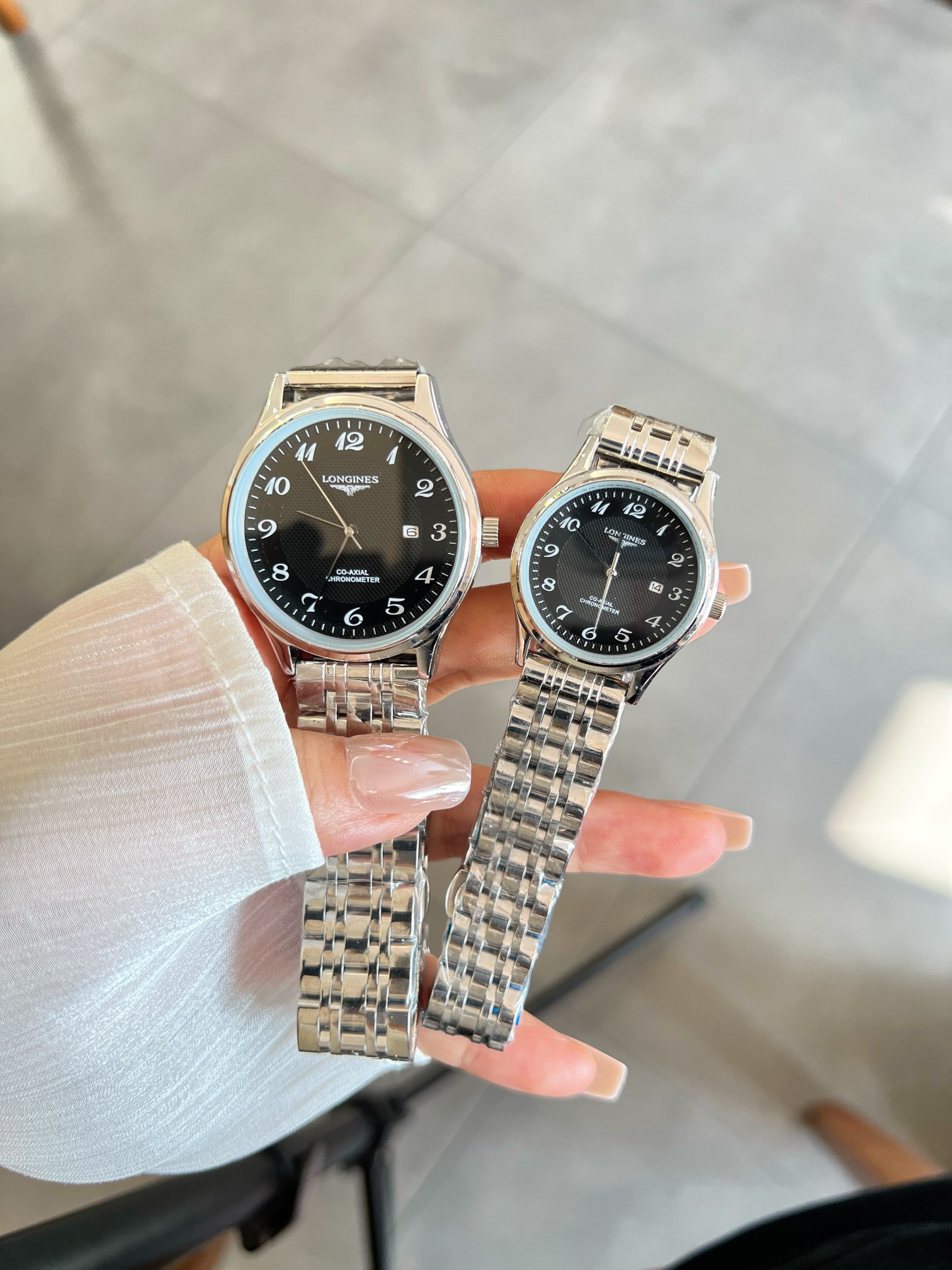 白190-金210 钢带+20 。浪琴-LONGINES‼️精品情侣对表🌹🌹🌹携手而来，简约精致，品质精湛，热卖全城。采用进口石英机芯，顶级316精钢表壳，进口小牛皮表带，矿物质超强镜面，男款尺寸40*10，女款尺寸 30*10🔥顶级出品 精品不断🔥