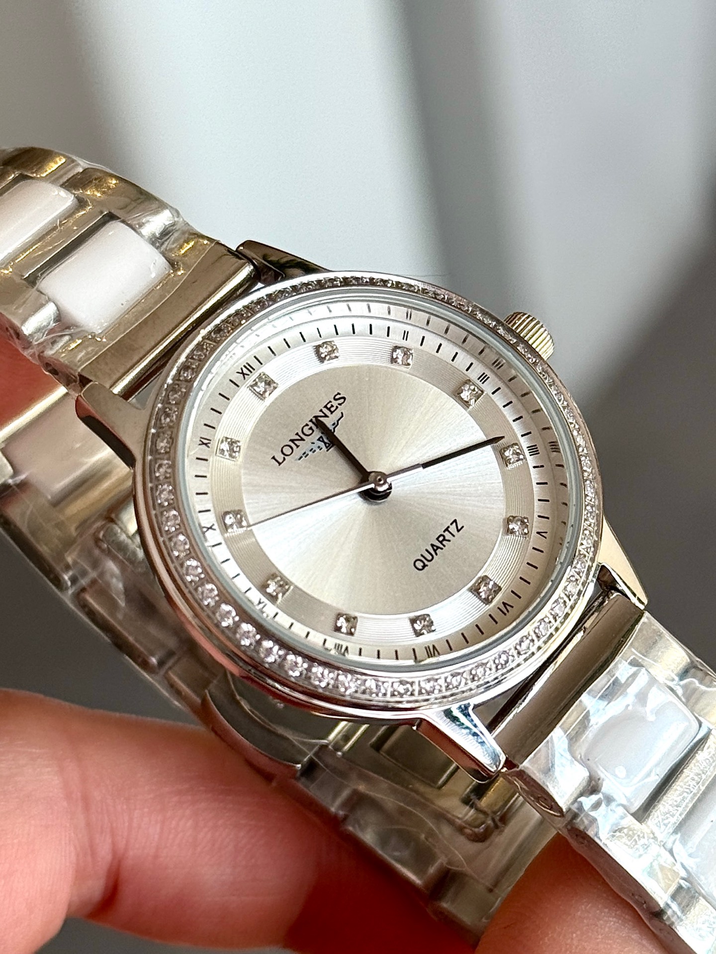 Longines Unknown quartz dress watch silver case and bezel, silver dial, silver strap 28mm Women's Quartz