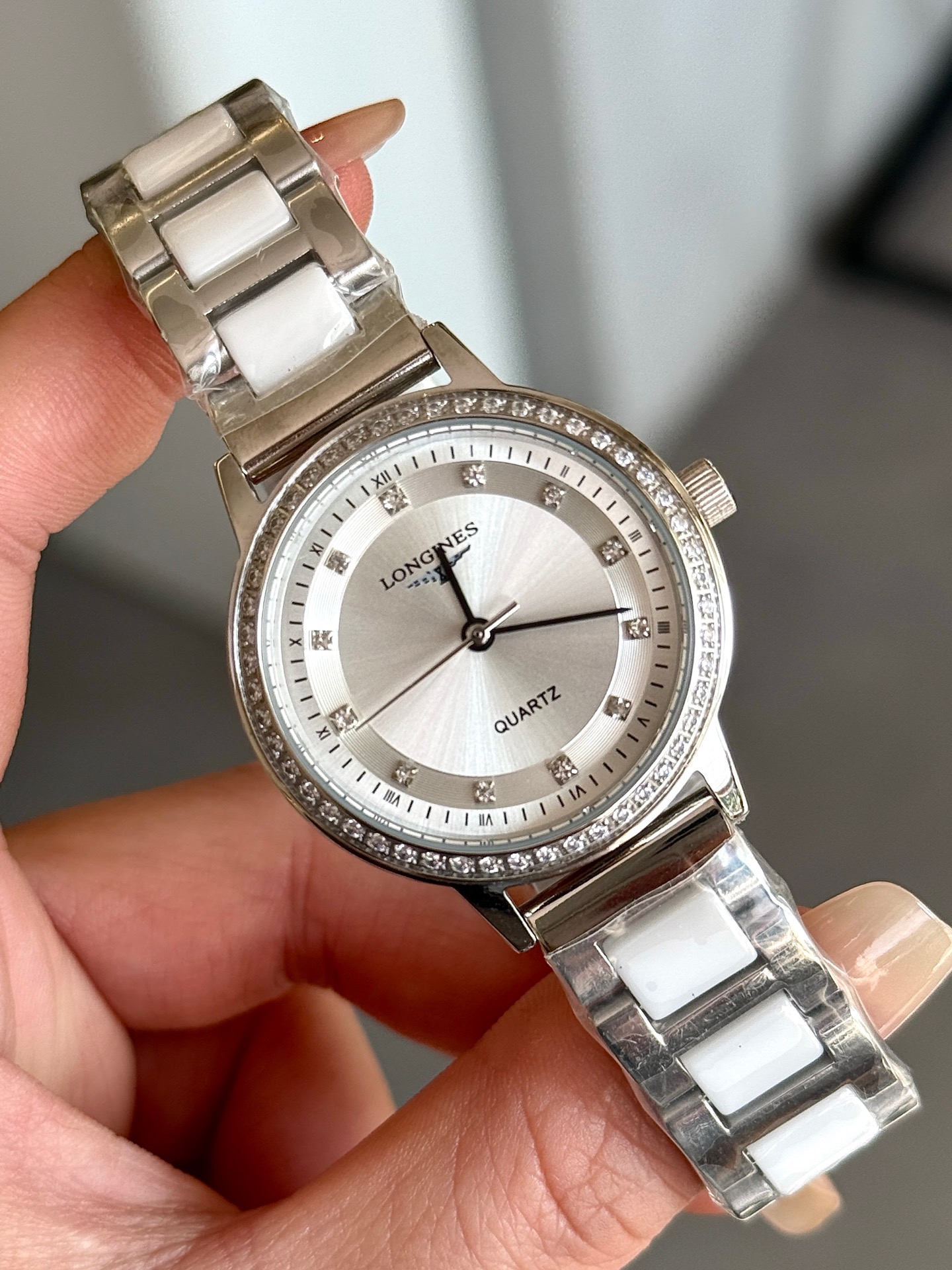 Longines Unknown quartz dress watch silver case and bezel, silver dial, silver strap 28mm Women's Quartz