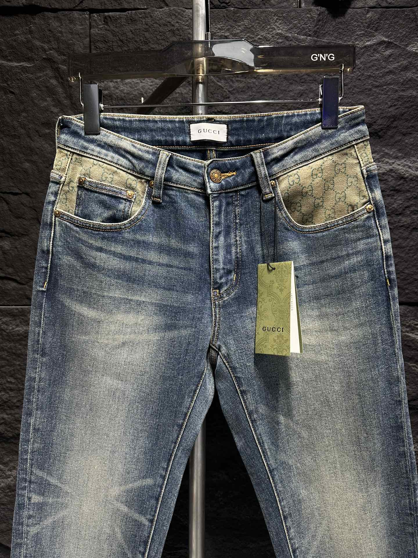 Gucci Men's Blue Denim Jeans with Signature Logo Waistband and Cuffed Hems 3 i1747547649 3508 2