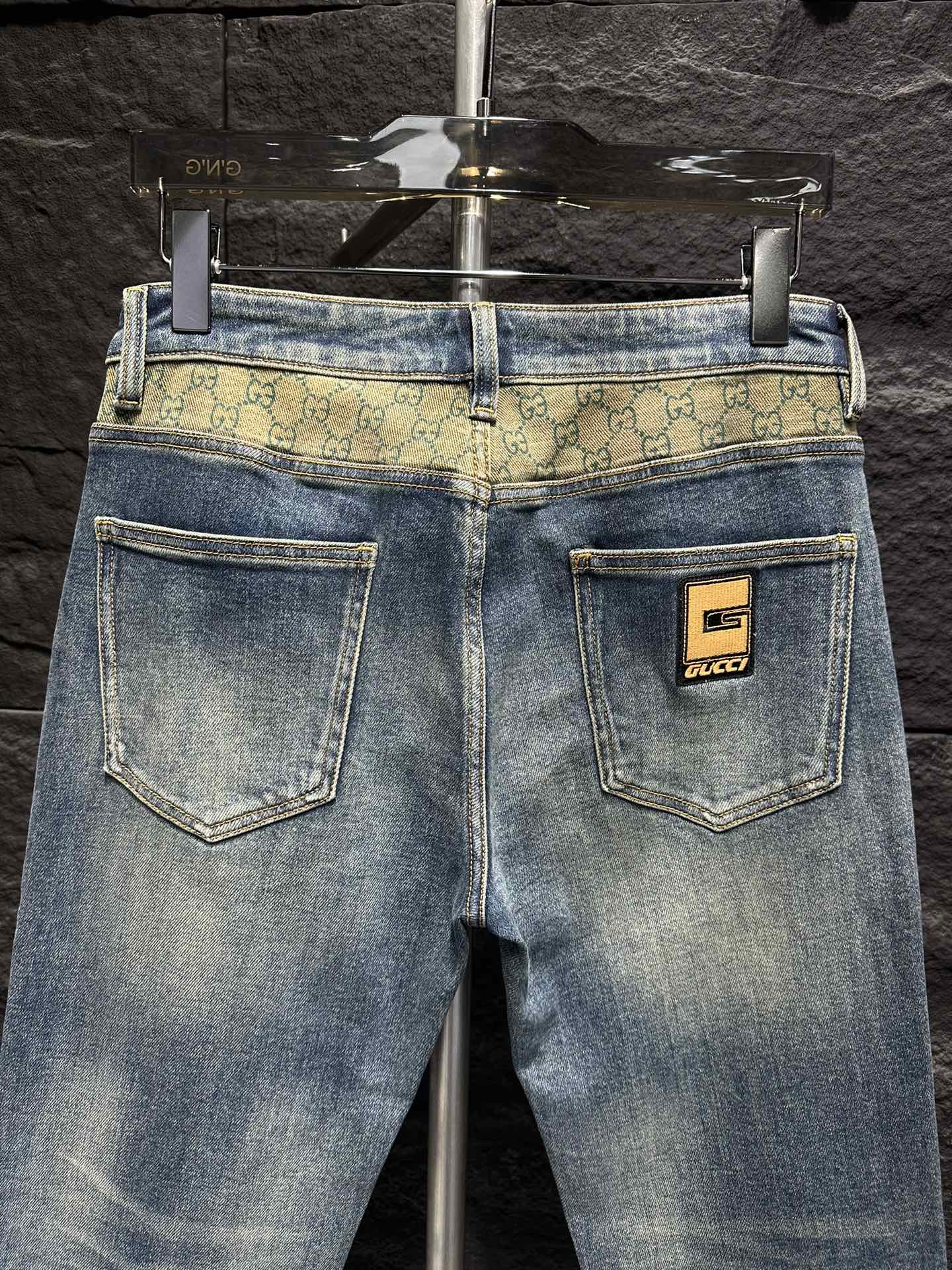 Gucci Men's Blue Denim Jeans with Signature Logo Waistband and Cuffed Hems 7 i1747547649 4036 0