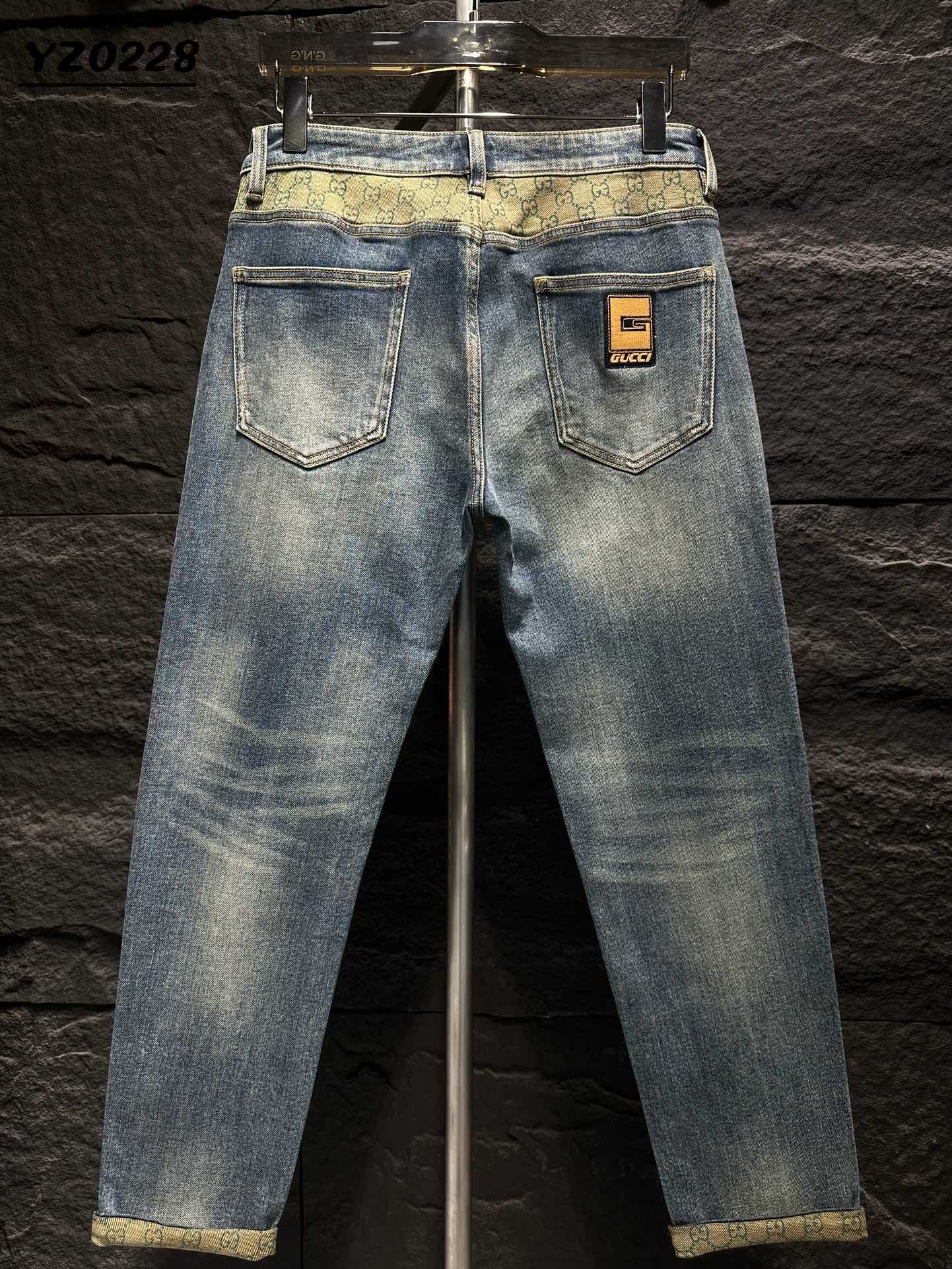 Gucci Men's Blue Denim Jeans with Signature Logo Waistband and Cuffed Hems 1 i1747547649 6576 7