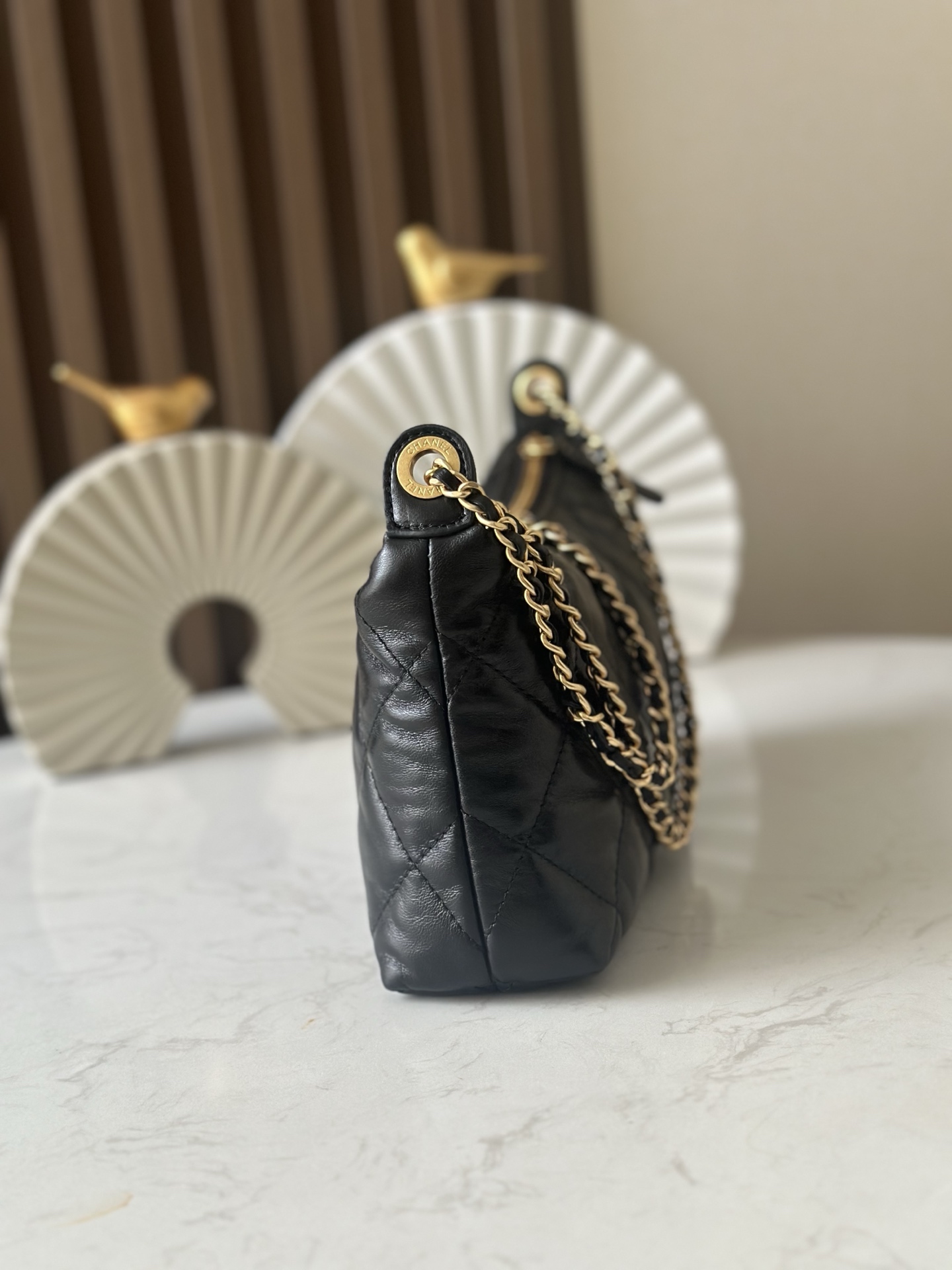 Chanel Style Black Leather Hobo Bag style reference detail image 2 from source 776542