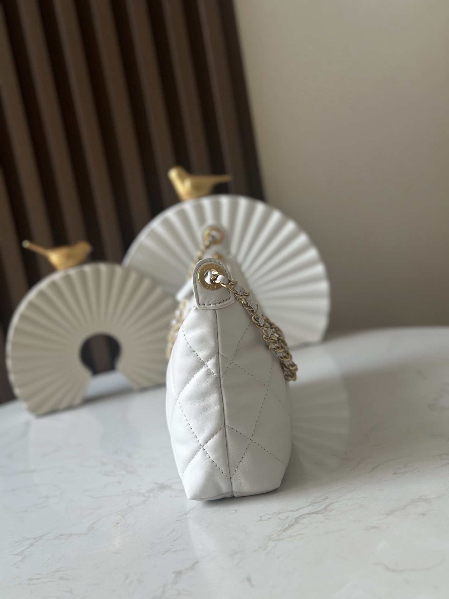 Chanel Style White Leather Hobo Bag style reference detail image 2 from source 776544