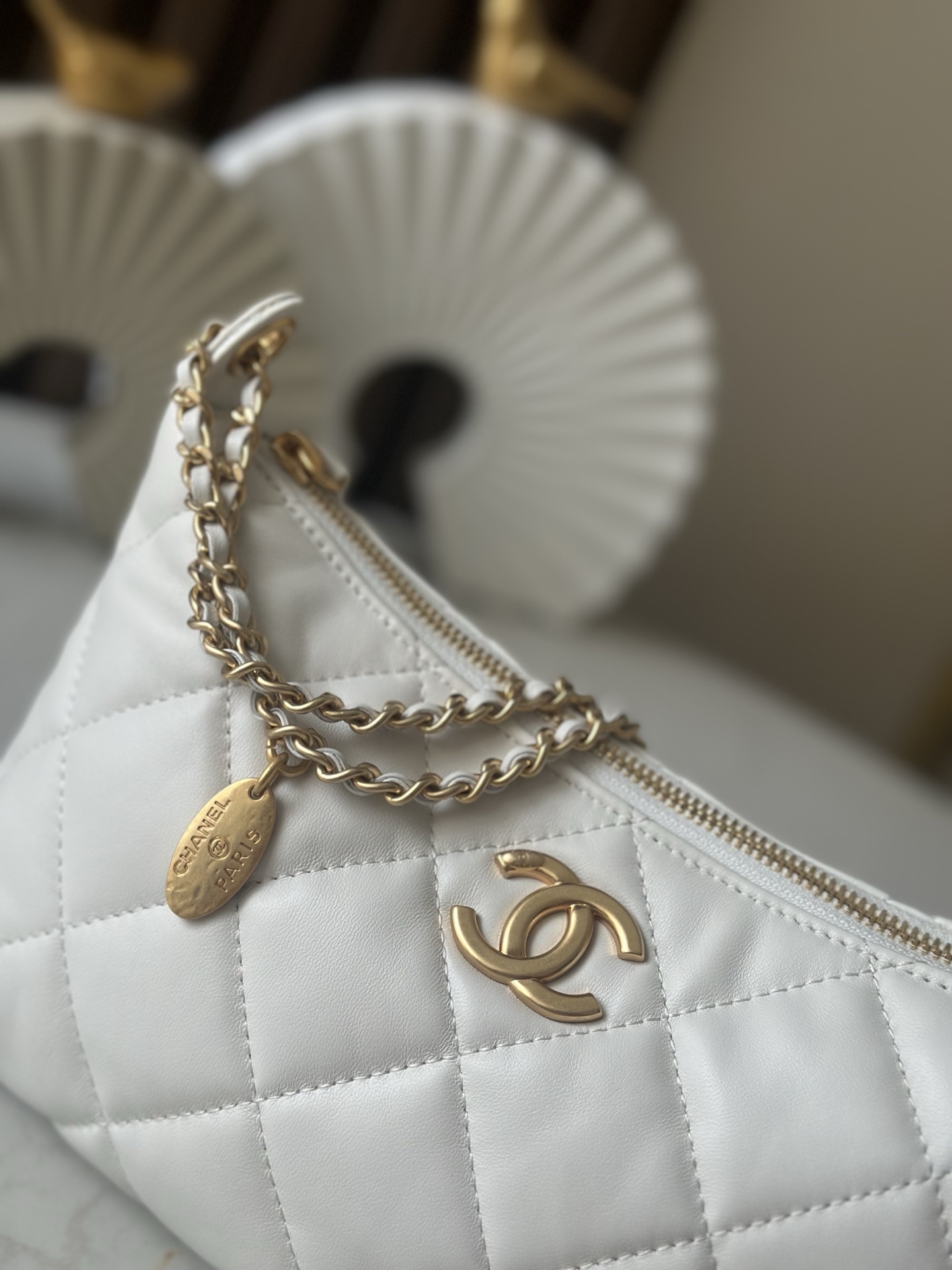 Chanel Style White Leather Hobo Bag style reference detail image 6 from source 776544