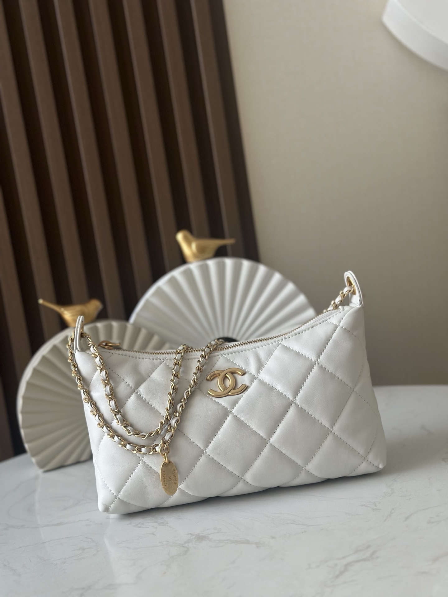 Chanel Style White Leather Hobo Bag style reference detail image 1 from source 776544