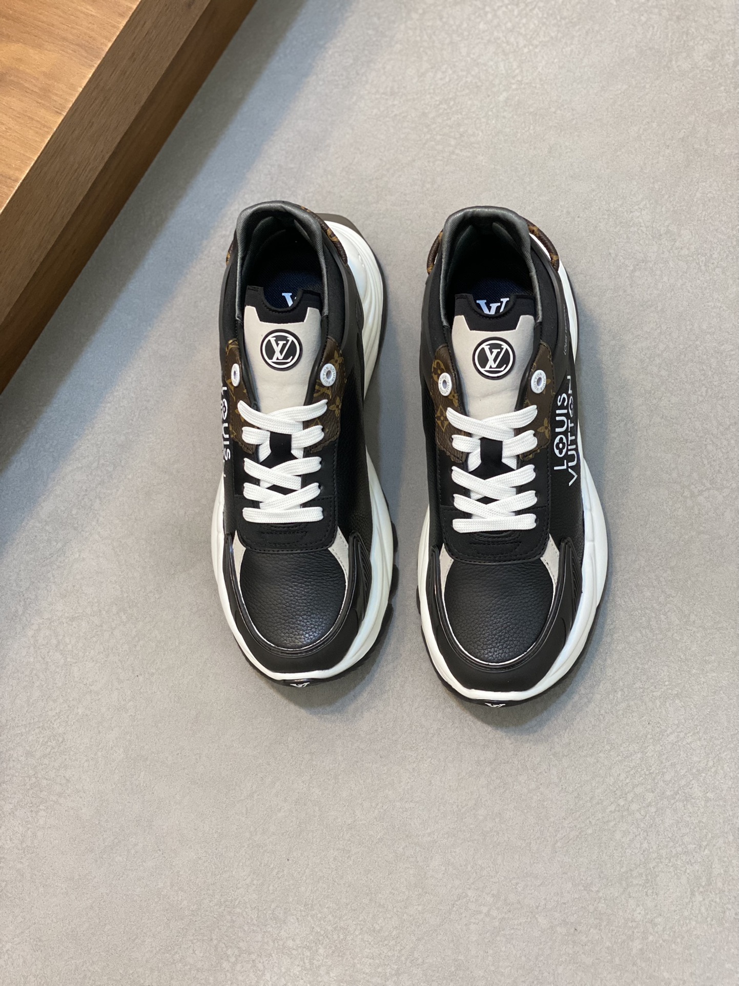 Louis Vuitton Premium Black Leather Sneakers with Designer Accents 2 i1731689743 3539 0