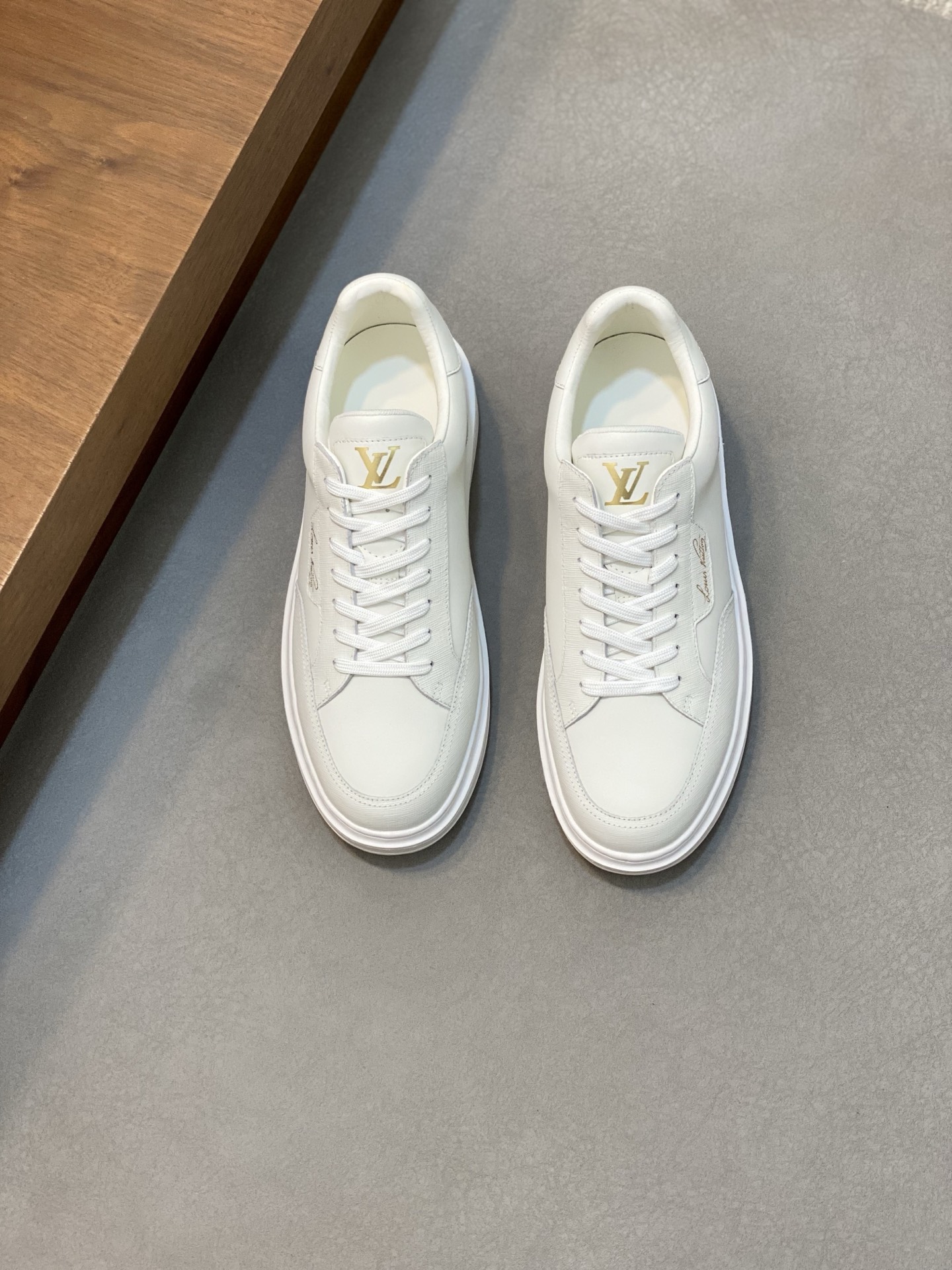 Louis Vuitton Men's White Leather Casual Sneakers with Monogram Detail
