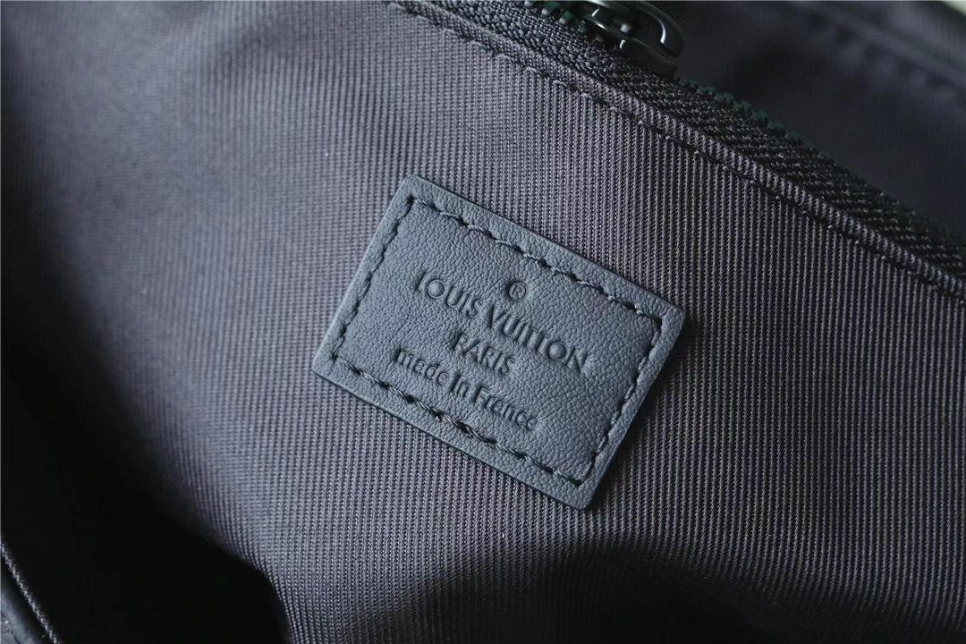 The bag is equipped with multiple pockets and compartments for easy - Bag 9