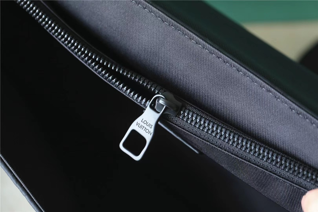 The bag is equipped with multiple pockets and compartments for easy - Bag 8