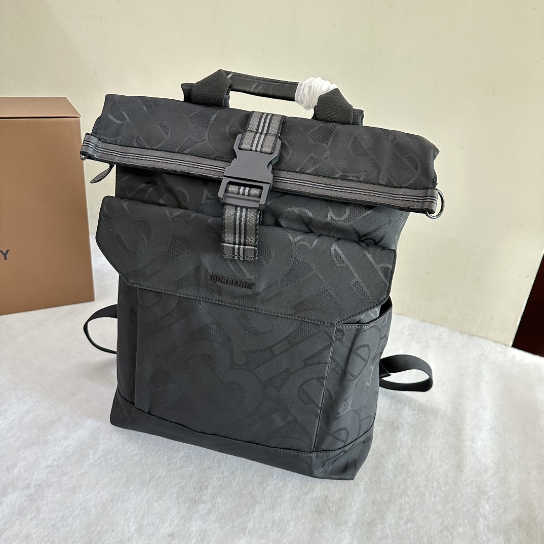 25 new product launch Burberry original Burberry backpack with ample space, made of cotton blended fabric. It has a rolled handle at the top and
