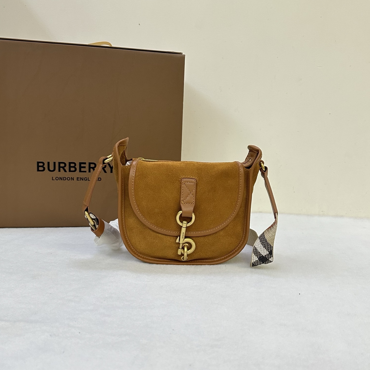 Original B's mini B-shaped buckle messenger bag, made of calfskin suede material and refined in an Italian workshop