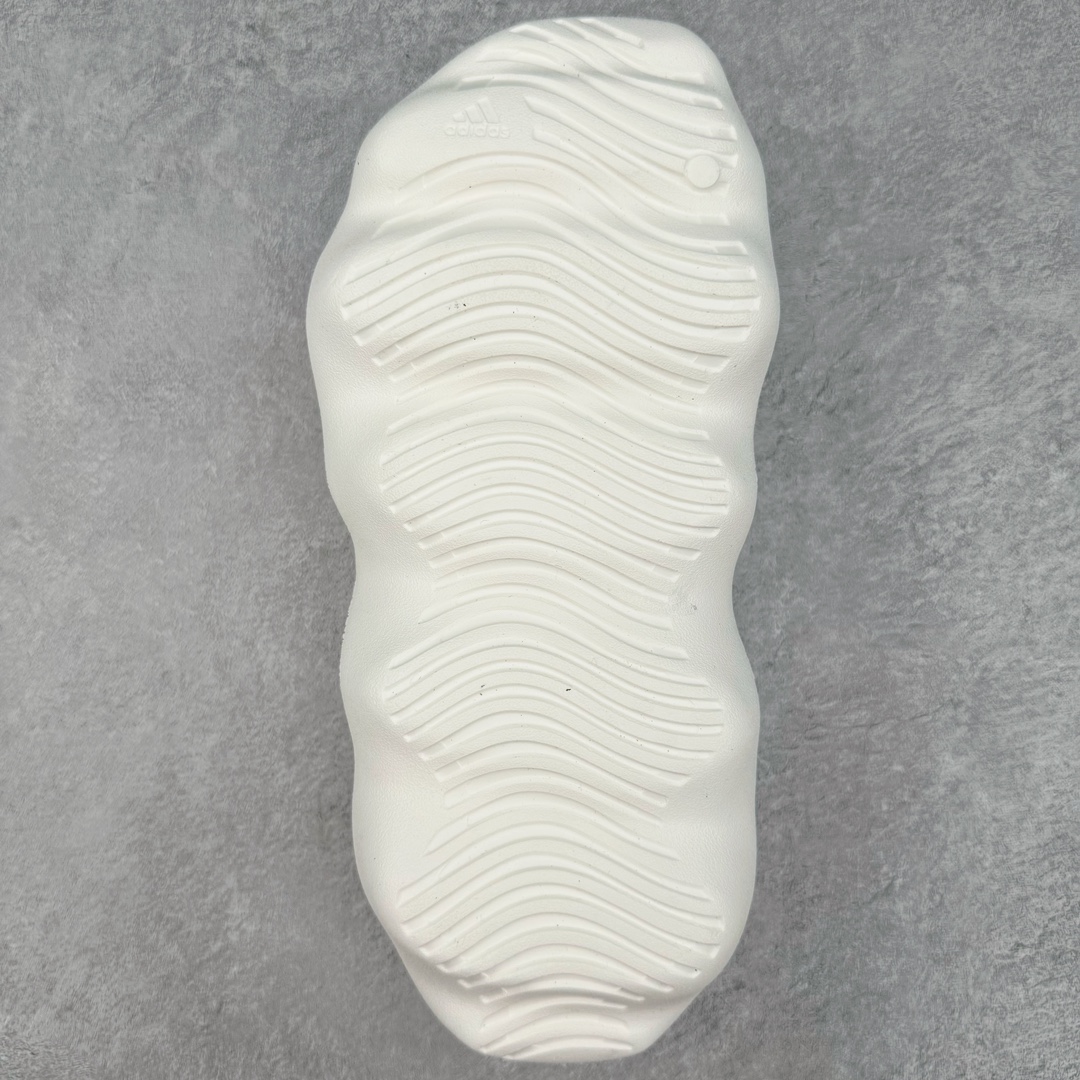 图片[9]-Kanye West x AD Yeezy 450 Slide 450异型火山骨架系列椰子户外风格沙滩涉水百搭运动穿搭拖鞋 GZ9861 由 Kanye West 与AD共同打造的 YEEZY Slide 于去年正式发布，一体成形的极简设计，以 EVA 泡棉制作，轻巧且耐用，同时其滑动设计方便穿套，配置鞋底凹埳的设计亦提供最大缓震及抓地力，并以「Desert Sand」，「Bone」及「Resin」三款大地色系展开。 今番捎来 YEEZY Slide 全新拖鞋设计，其山形穿孔外型令人联想到过往曾曝光过的 YEEZY 450，以奇特造型为人印象深刻，不过贴文中表示本款拖鞋名称就为 YEEZY 450 SLIDE 尺码：36 37 38 39 40 41 42 43 44 45 46-选品中心