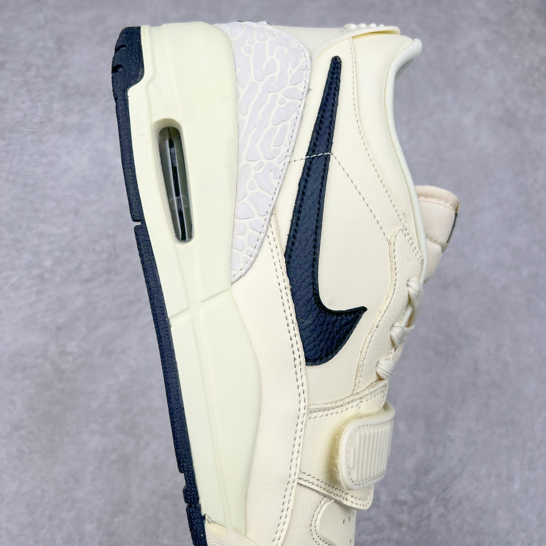 图片[6]-Air Jordan Legacy AJ312 低帮 HV1807-101 鞋身采用了皮革材质打造 横跨鞋面的魔术贴十分吸睛 侧面的Swoosh Logo的一部分被鞋面遮挡了一部分 颇具玩味 魔术贴上标有NK标识 而鞋舌上是Jordan的经典飞翼Logo 后跟和鞋底均采用了Air Jordan 3 的设计 后跟上同样也使用了经典的爆裂纹图案 尺码：36 36.5 37.5 38 38.5 39 40 40.5 41 42 42.5 43 44 44.5 45 46 47.5-选品中心