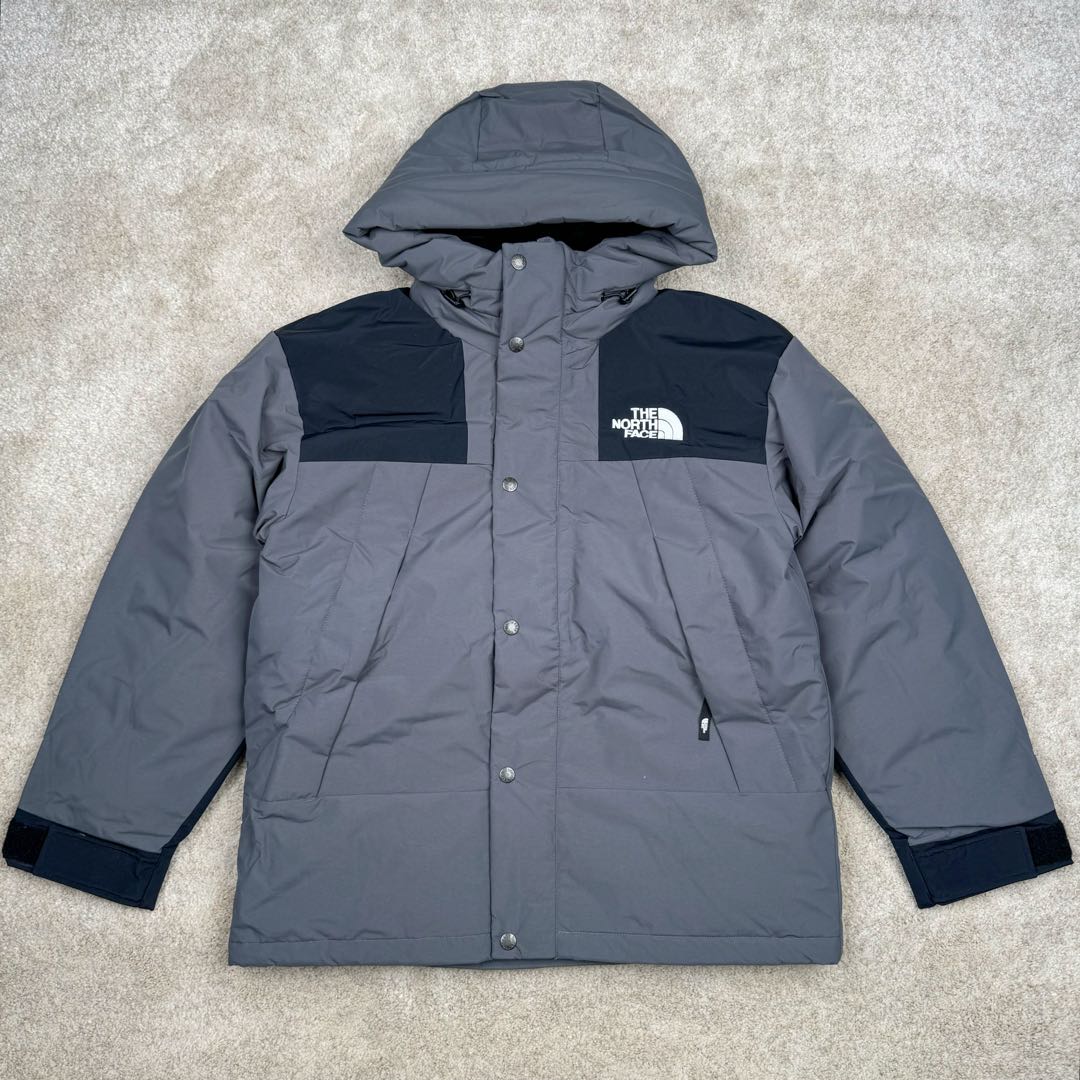 THE NORTH FACE Mountain FW24 Gore-Tex dryvent ULTIMATE 北面山脉系列防水面料刺绣LOGO防风保暖鹅绒连帽含羽绒外套男女同款 The North Face于1966年成立，一直致力于为户外运动员的每一次严酷探索提供专业装备。作为全球户外运动领导品牌，The NorthFace以经过专业运动员测试、适应各类户外需求的产品助力探索者不断超越自我，激发人类潜能。The North Face象征着众多山脉中更冷、更值得挑战的北坡。品牌标志则来自Half Dome，一座位于美国加州Yosemite NationalPark（优胜美地国家公园）里的山峰，中文名字取为「北面」，象征着不畏惧的户外探索精神。1997年，The North Face采用全新的宣传标语「Never Stop Exploring探索永不停止」，体现品牌的探索精神，成为品牌的座右铭。尺码：XS S M L XL 2XL-选品中心
