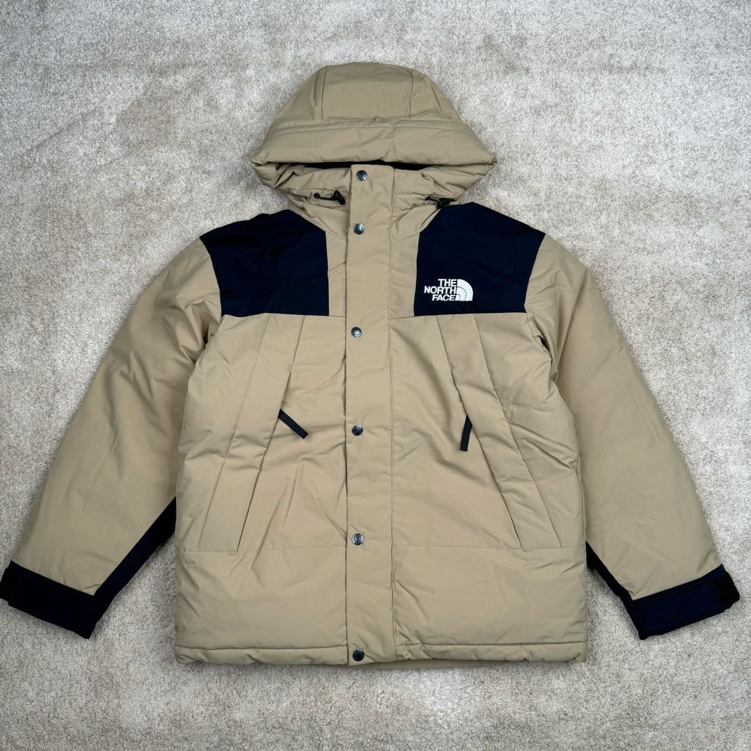 THE NORTH FACE Mountain FW24 Gore-Tex dryvent ULTIMATE 北面山脉系列防水面料刺绣LOGO防风保暖鹅绒连帽含羽绒外套男女同款 The North Face于1966年成立，一直致力于为户外运动员的每一次严酷探索提供专业装备。作为全球户外运动领导品牌，The NorthFace以经过专业运动员测试、适应各类户外需求的产品助力探索者不断超越自我，激发人类潜能。The North Face象征着众多山脉中更冷、更值得挑战的北坡。品牌标志则来自Half Dome，一座位于美国加州Yosemite NationalPark（优胜美地国家公园）里的山峰，中文名字取为「北面」，象征着不畏惧的户外探索精神。1997年，The North Face采用全新的宣传标语「Never Stop Exploring探索永不停止」，体现品牌的探索精神，成为品牌的座右铭。尺码：XS S M L XL 2XL-选品中心