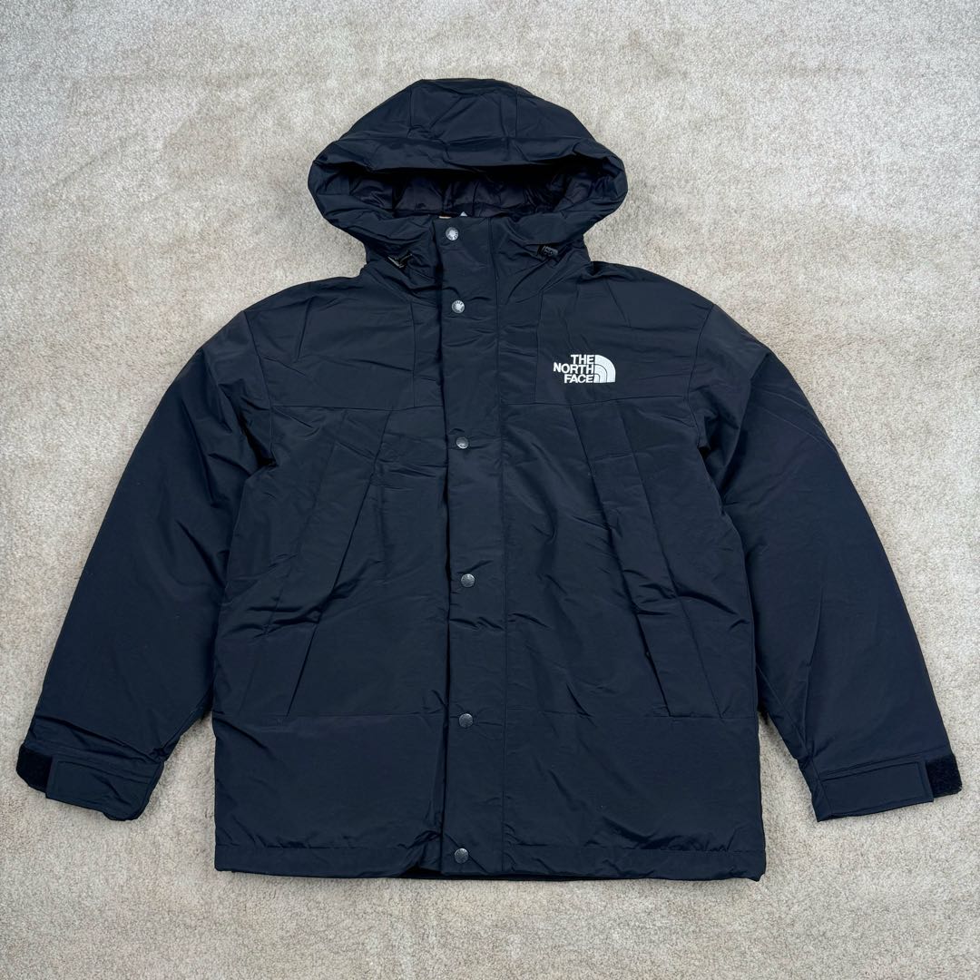 THE NORTH FACE Mountain FW24 Gore-Tex dryvent ULTIMATE 北面山脉系列防水面料刺绣LOGO防风保暖鹅绒连帽含羽绒外套男女同款 The North Face于1966年成立，一直致力于为户外运动员的每一次严酷探索提供专业装备。作为全球户外运动领导品牌，The NorthFace以经过专业运动员测试、适应各类户外需求的产品助力探索者不断超越自我，激发人类潜能。The North Face象征着众多山脉中更冷、更值得挑战的北坡。品牌标志则来自Half Dome，一座位于美国加州Yosemite NationalPark（优胜美地国家公园）里的山峰，中文名字取为「北面」，象征着不畏惧的户外探索精神。1997年，The North Face采用全新的宣传标语「Never Stop Exploring探索永不停止」，体现品牌的探索精神，成为品牌的座右铭。尺码：XS S M L XL 2XL-选品中心