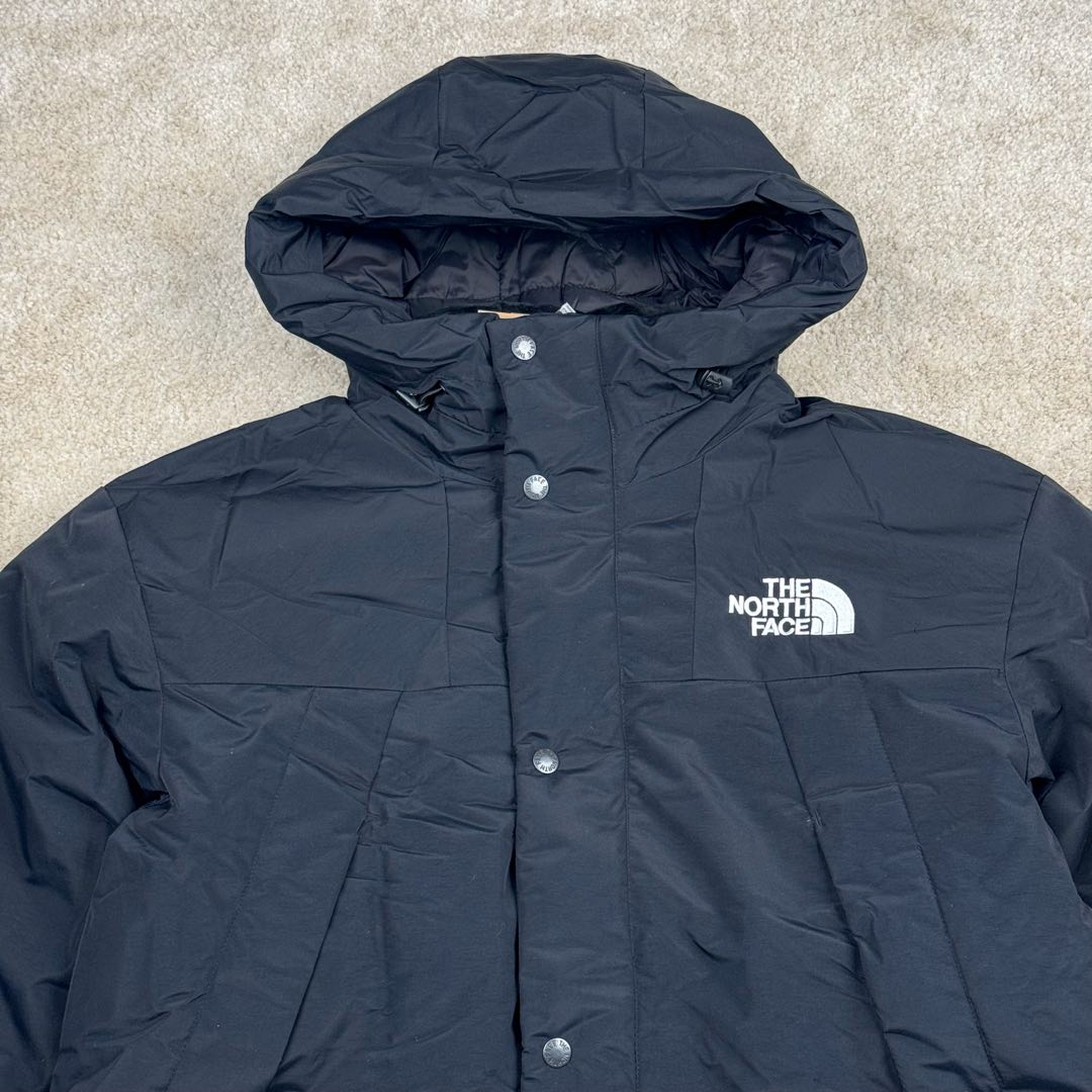 图片[4]-THE NORTH FACE Mountain FW24 Gore-Tex dryvent ULTIMATE 北面山脉系列防水面料刺绣LOGO防风保暖鹅绒连帽含羽绒外套男女同款 The North Face于1966年成立，一直致力于为户外运动员的每一次严酷探索提供专业装备。作为全球户外运动领导品牌，The NorthFace以经过专业运动员测试、适应各类户外需求的产品助力探索者不断超越自我，激发人类潜能。The North Face象征着众多山脉中更冷、更值得挑战的北坡。品牌标志则来自Half Dome，一座位于美国加州Yosemite NationalPark（优胜美地国家公园）里的山峰，中文名字取为「北面」，象征着不畏惧的户外探索精神。1997年，The North Face采用全新的宣传标语「Never Stop Exploring探索永不停止」，体现品牌的探索精神，成为品牌的座右铭。尺码：XS S M L XL 2XL-选品中心