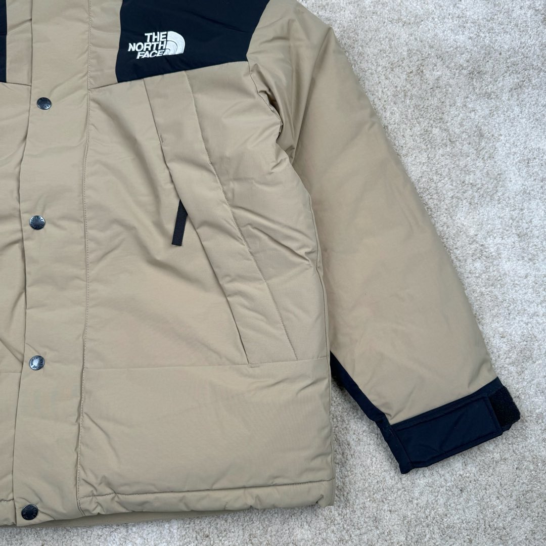 图片[6]-THE NORTH FACE Mountain FW24 Gore-Tex dryvent ULTIMATE 北面山脉系列防水面料刺绣LOGO防风保暖鹅绒连帽含羽绒外套男女同款 The North Face于1966年成立，一直致力于为户外运动员的每一次严酷探索提供专业装备。作为全球户外运动领导品牌，The NorthFace以经过专业运动员测试、适应各类户外需求的产品助力探索者不断超越自我，激发人类潜能。The North Face象征着众多山脉中更冷、更值得挑战的北坡。品牌标志则来自Half Dome，一座位于美国加州Yosemite NationalPark（优胜美地国家公园）里的山峰，中文名字取为「北面」，象征着不畏惧的户外探索精神。1997年，The North Face采用全新的宣传标语「Never Stop Exploring探索永不停止」，体现品牌的探索精神，成为品牌的座右铭。尺码：XS S M L XL 2XL-选品中心